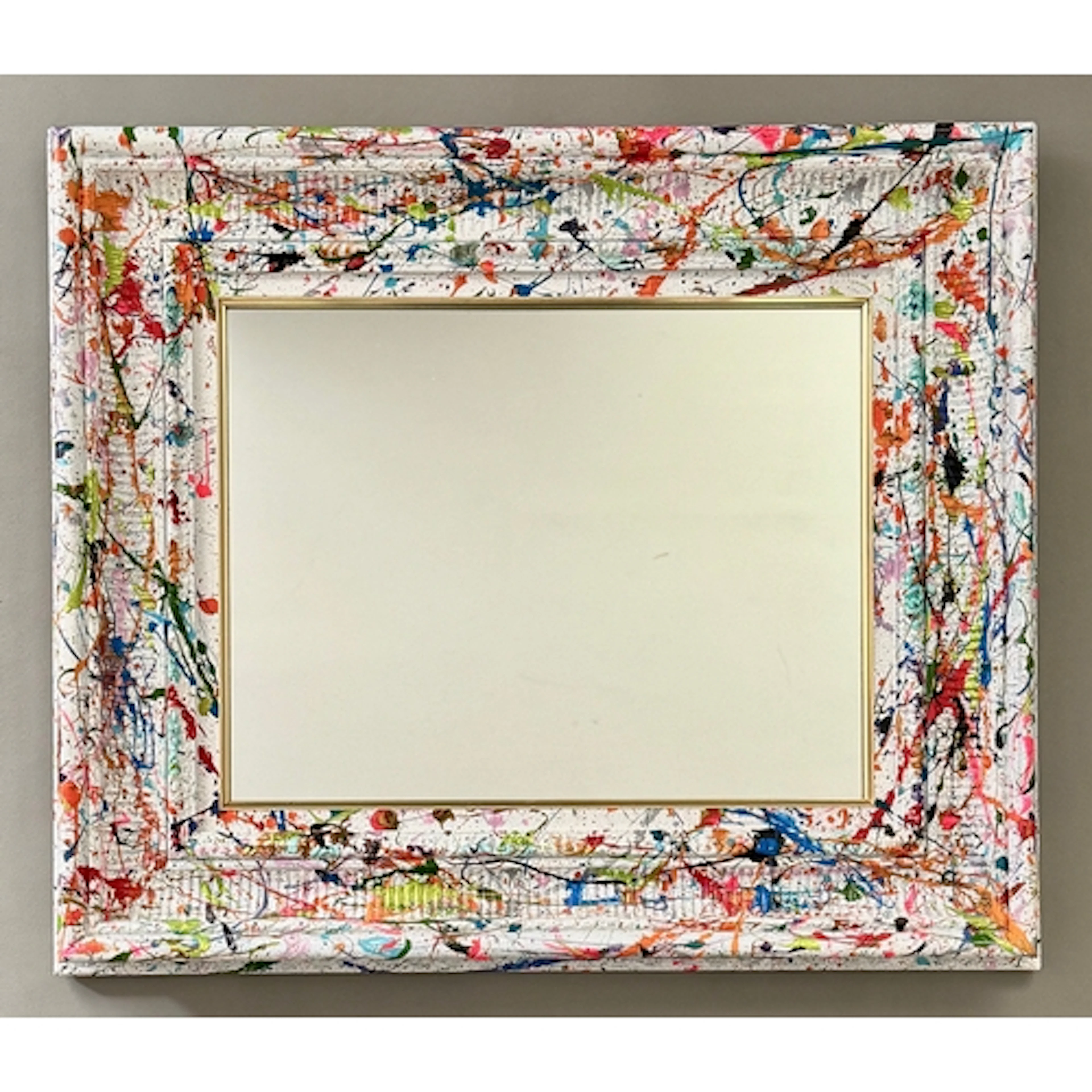 An avant garde mirror decorated in the manner of Jackson Pol...