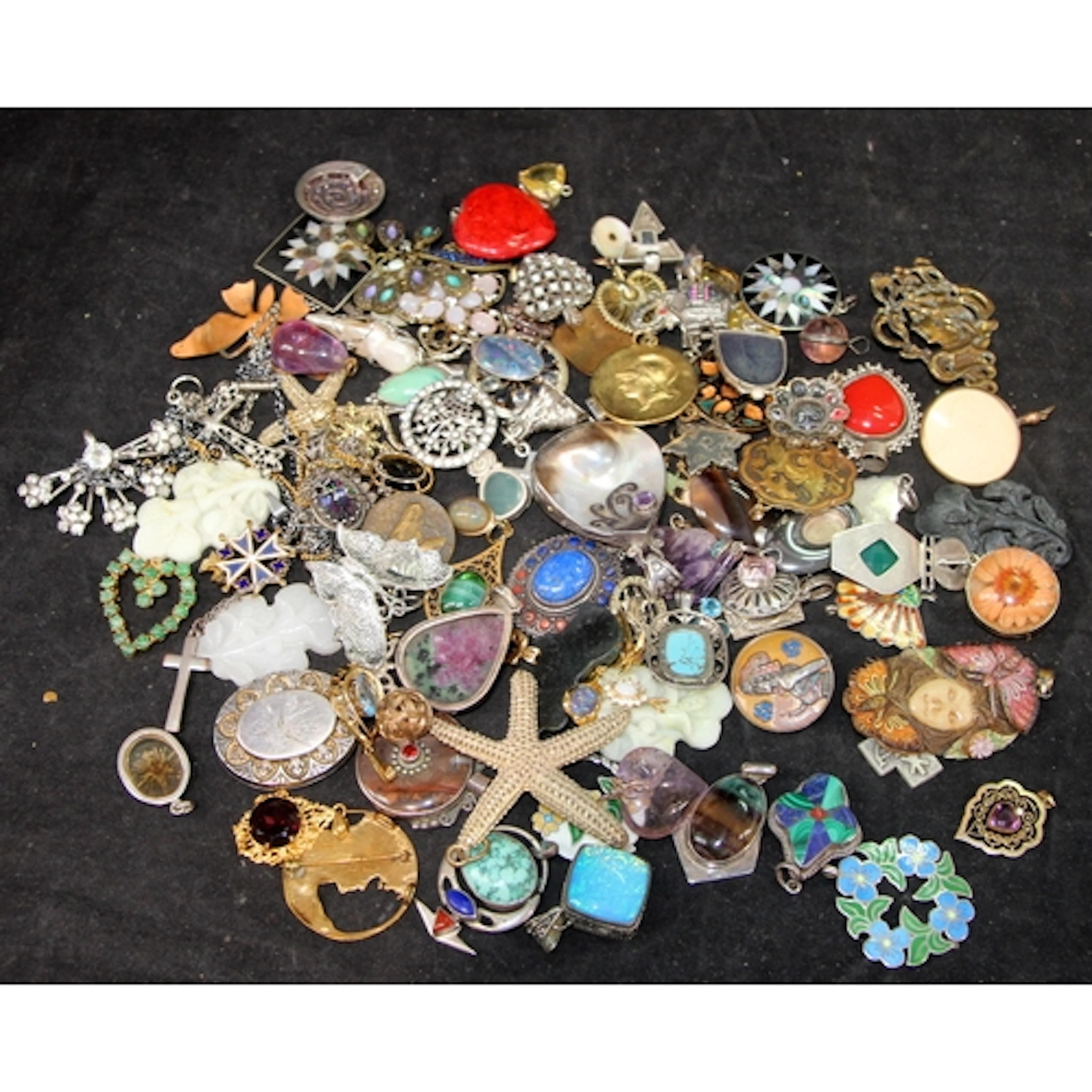A collection of pendants, vintage and modern, includes a goo...