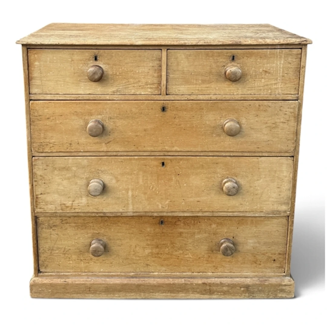 A VICTORIAN WAXED PINE CHEST OF TWO SHORT AND THREE LONG DRA...