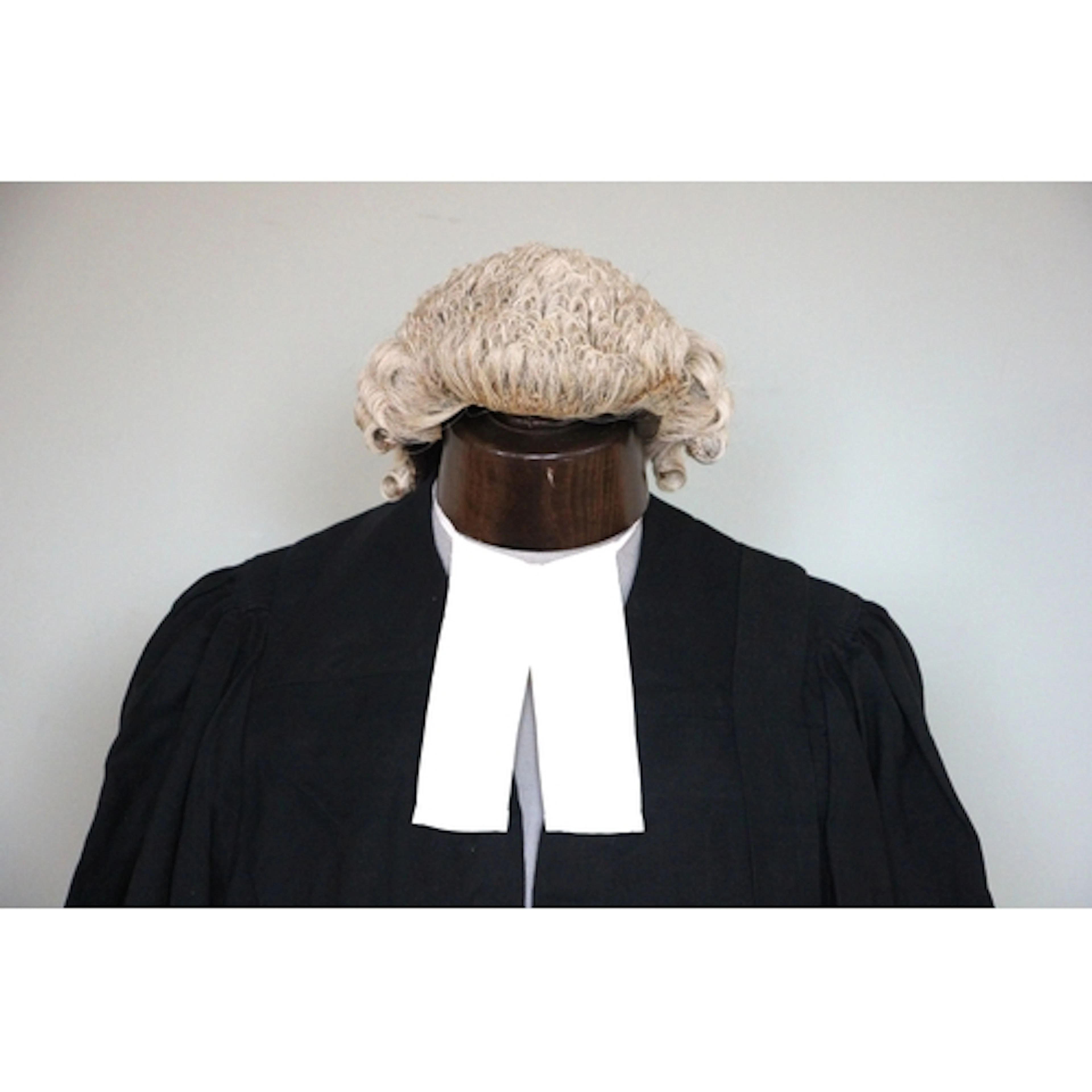 A barrister wig by Ravenscroft, and a gown by Ede & Ravenscr...