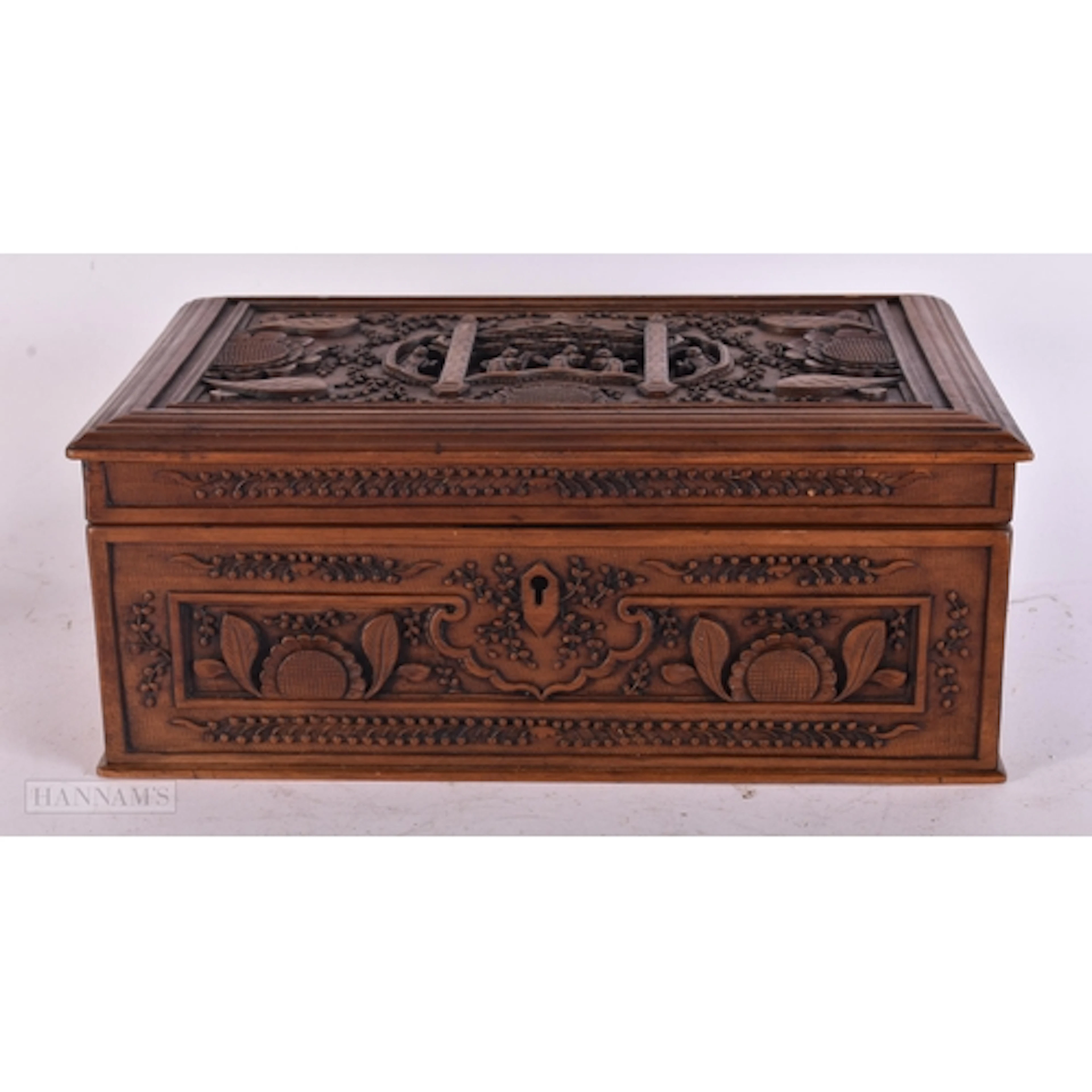 A LATE 19TH CENTURY CHINESE CARVED SANDALWOOD CASKET Late Qi...