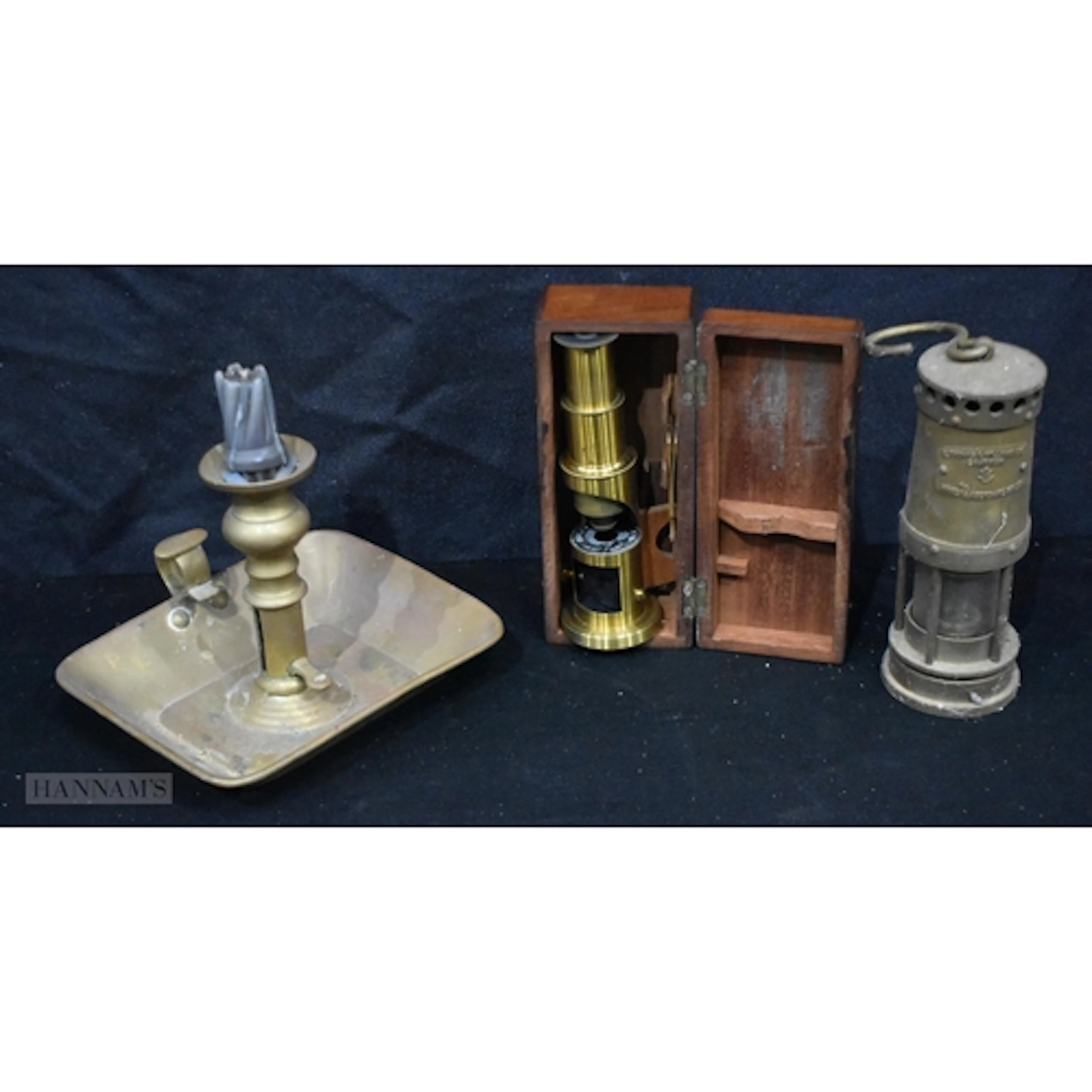 A vintage wooden cased small travelling microscope together ...