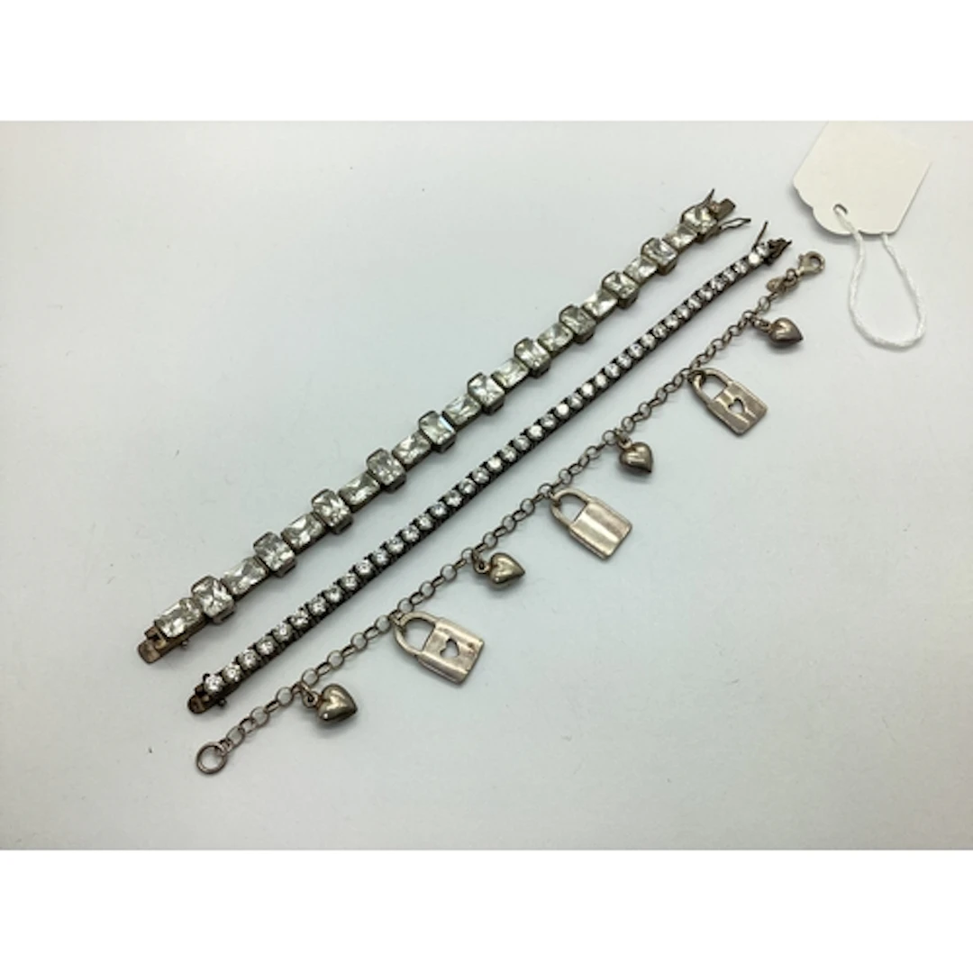 A Modern Claw Set Line Bracelet, of uniform design, to snap ...