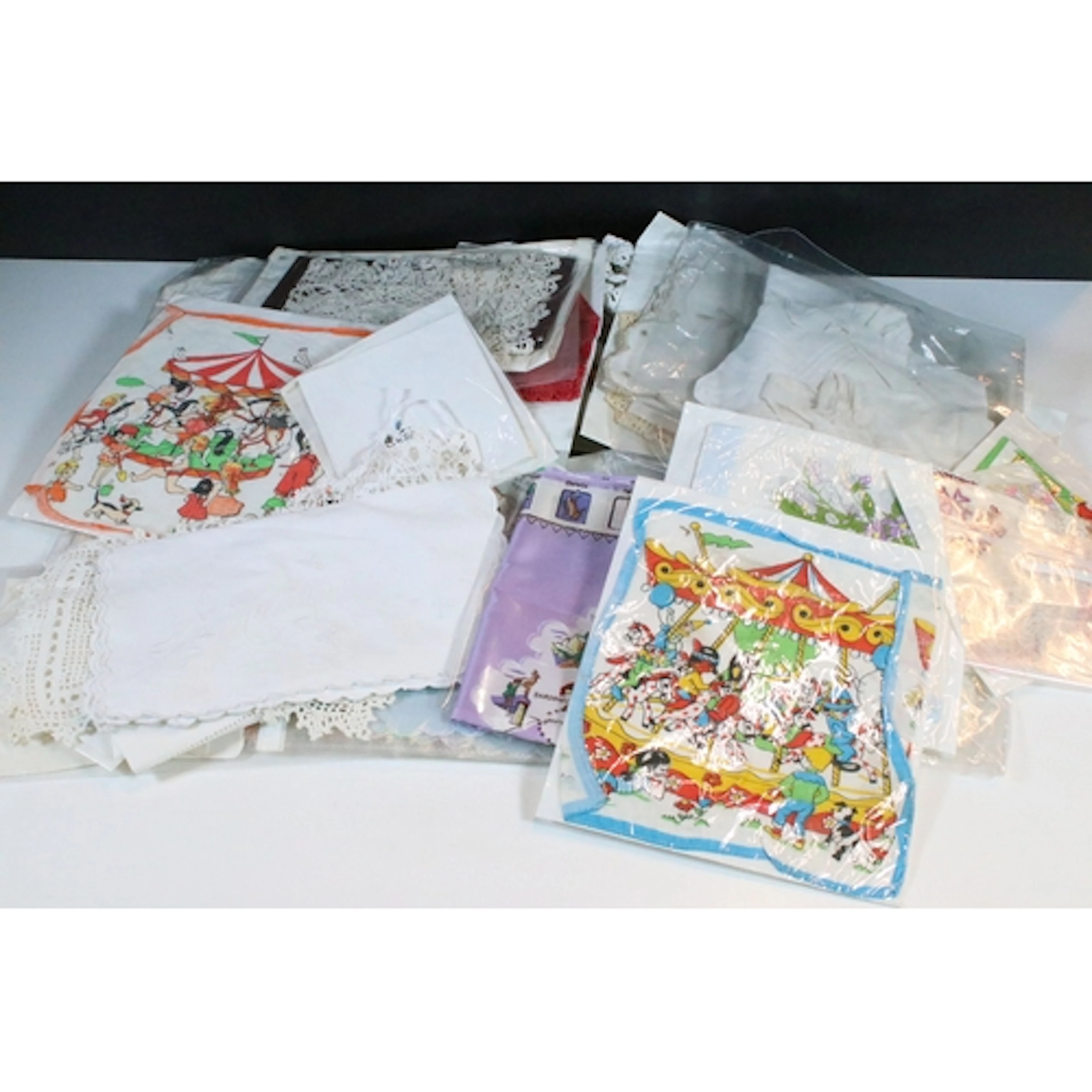 Collection of mid 20th century vintage embroidered fabrics, ...