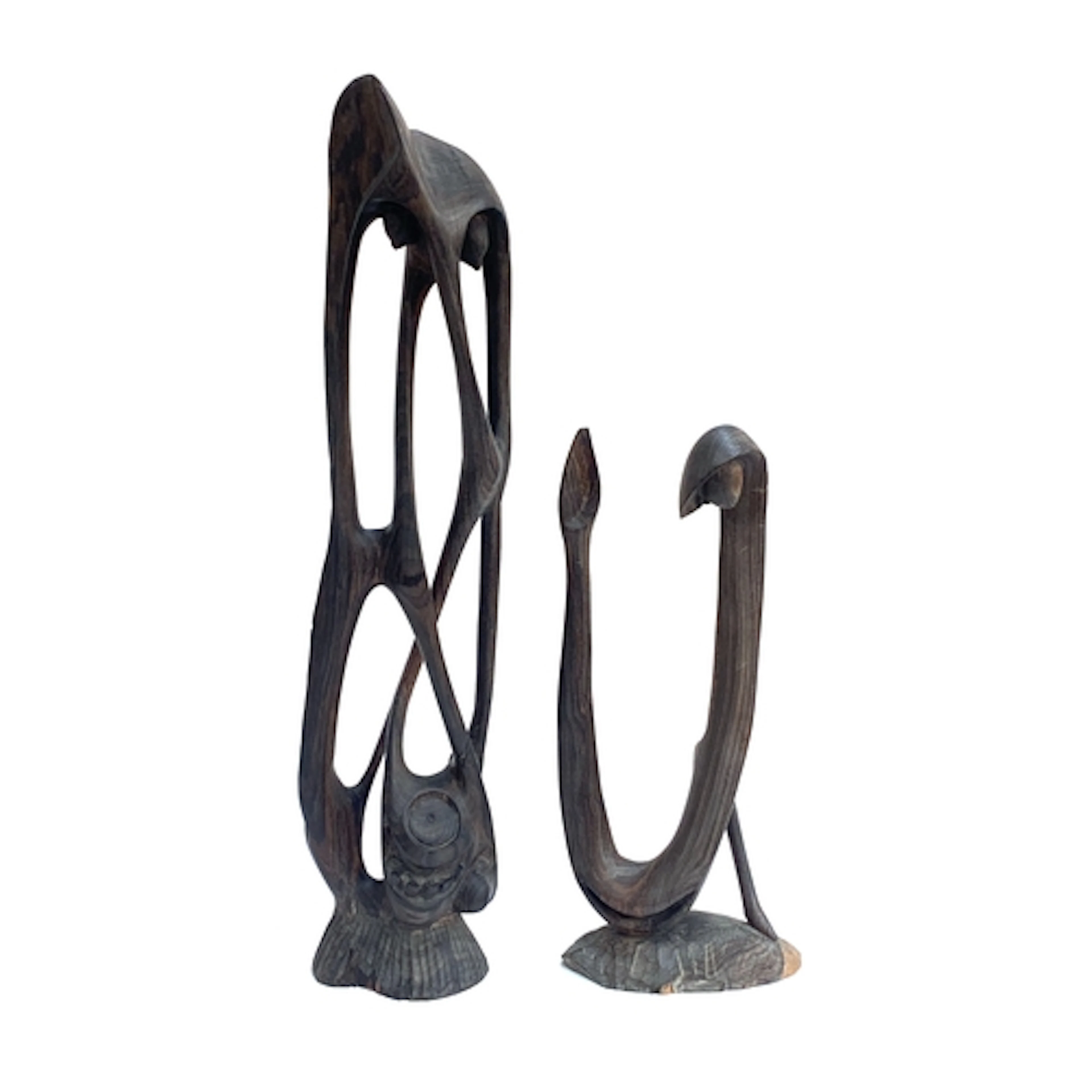 A Tanzanian Makonde style carved wooden abstract figure c.19...
