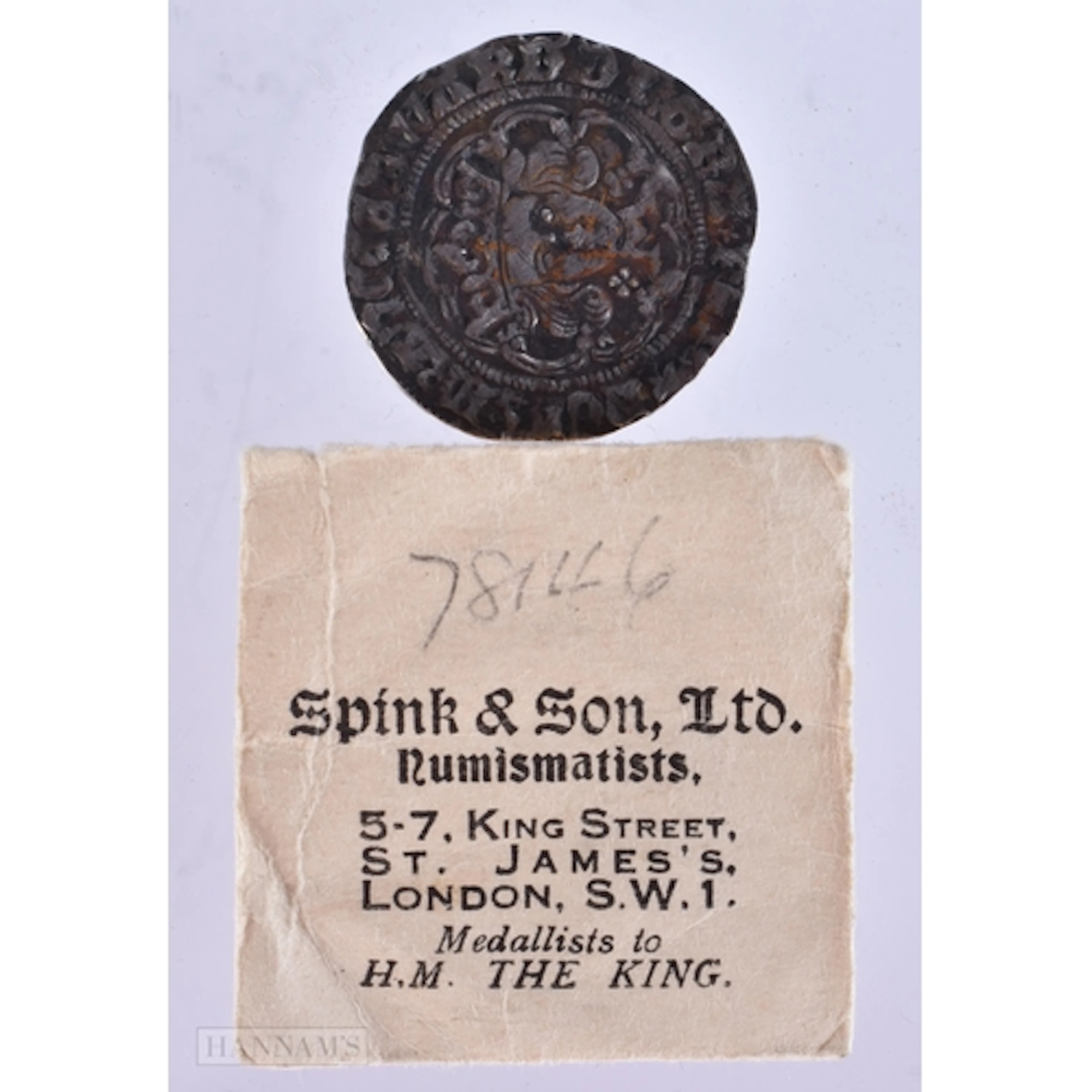 A Medieval Silver Hammered Coin. 2.5cm diameter, weight 3g