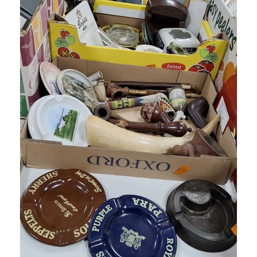 TWO BOXES OF VINTAGE SMOKING MEMORABILIA, to include a selec...