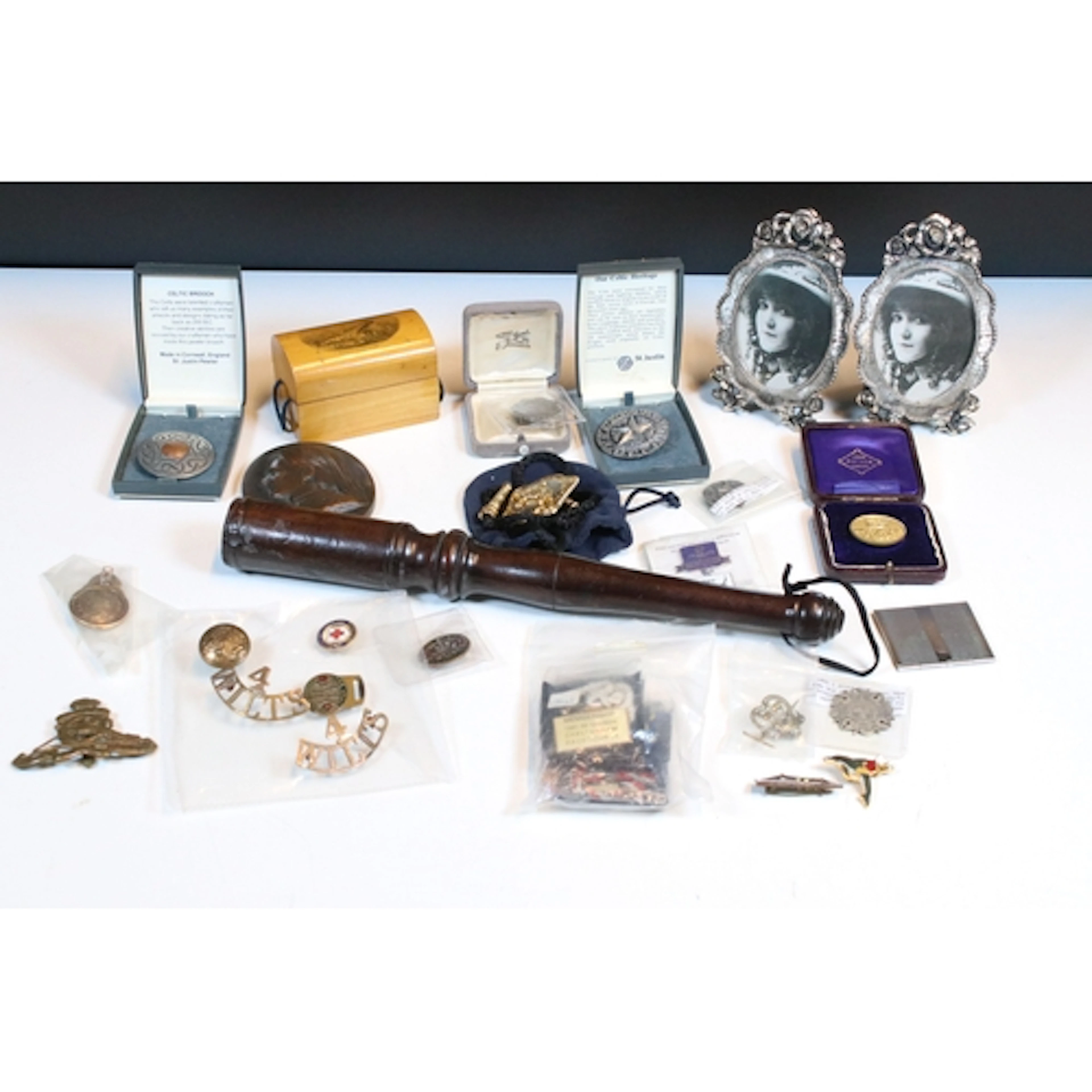 Assortment of items to include a Kruger Watch chain fob made...