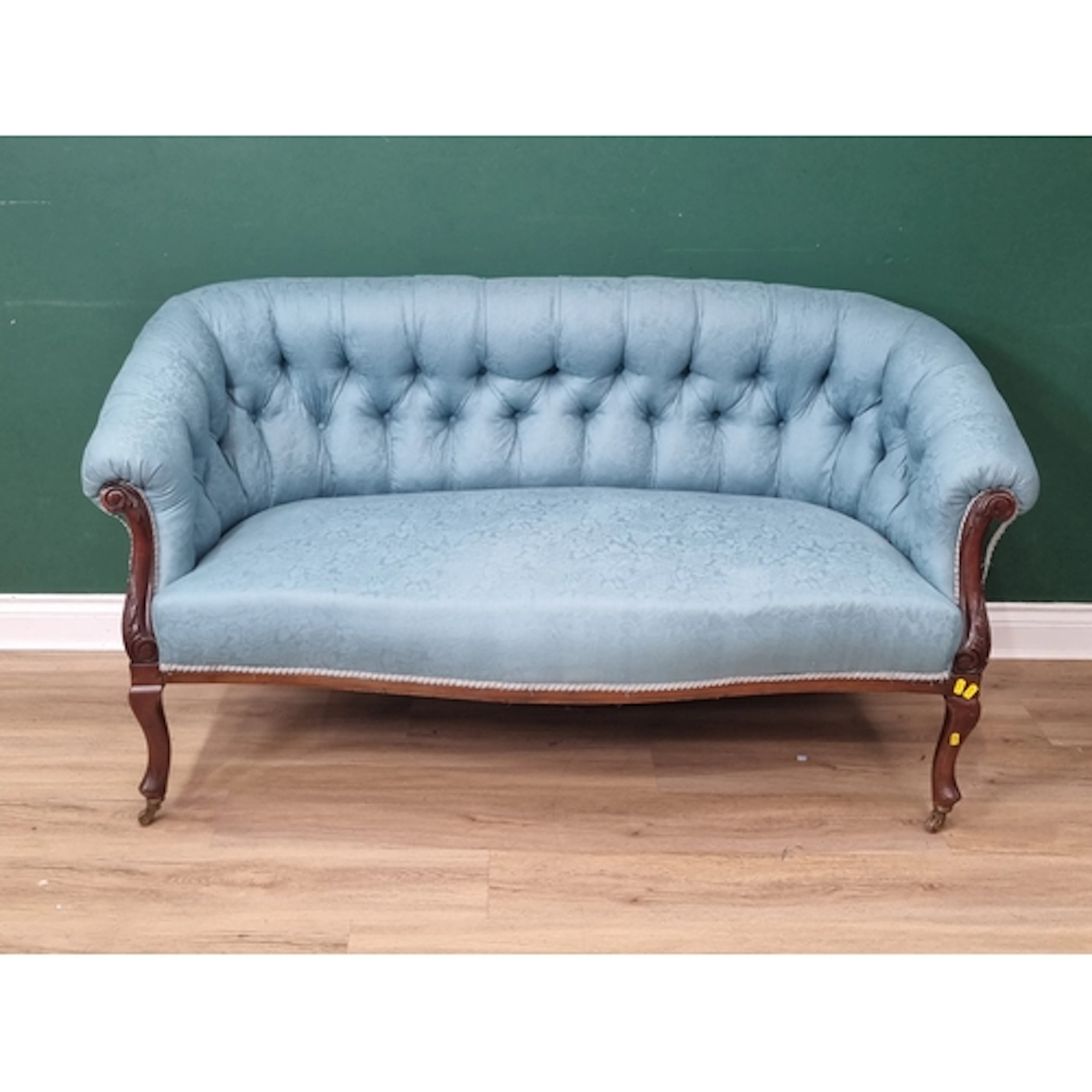 A blue upholstered two seater button back Settee, and a carv...