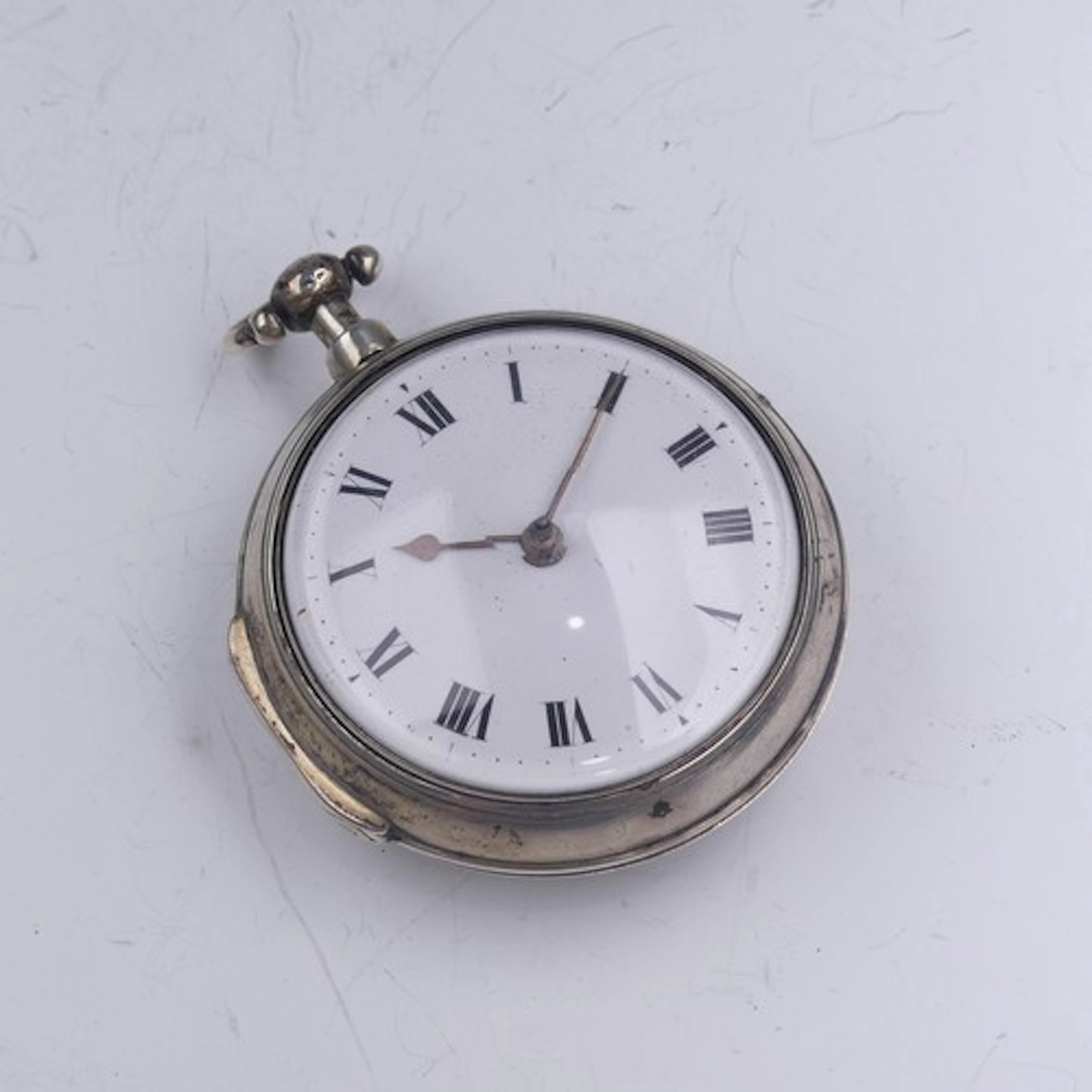 A George III silver pair cased Pocket Watch, the verge fusee...