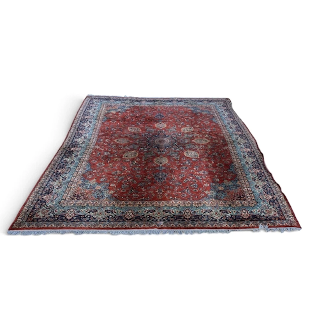 A PERSIAN WOOL CARPET 340cm x 245cm
