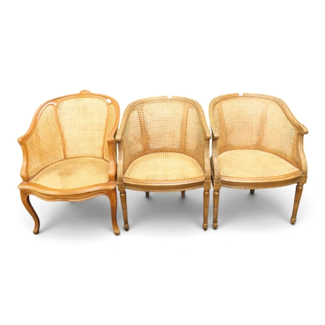 A lot comprising a pair of Louis XVI style bergere armchairs...