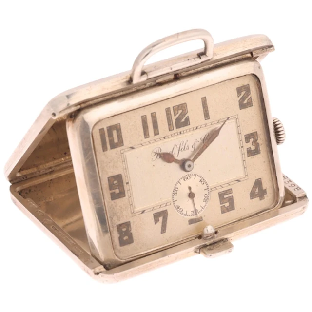 An Art Deco Swiss sterling silver mechanical purse watch, Bo...