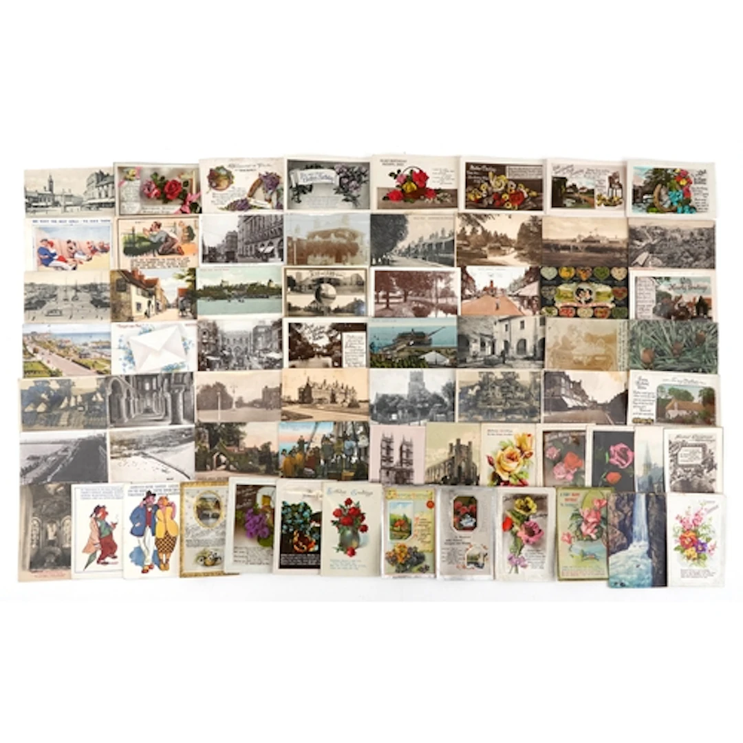 Early 20th century topographical and humorous postcards incl...