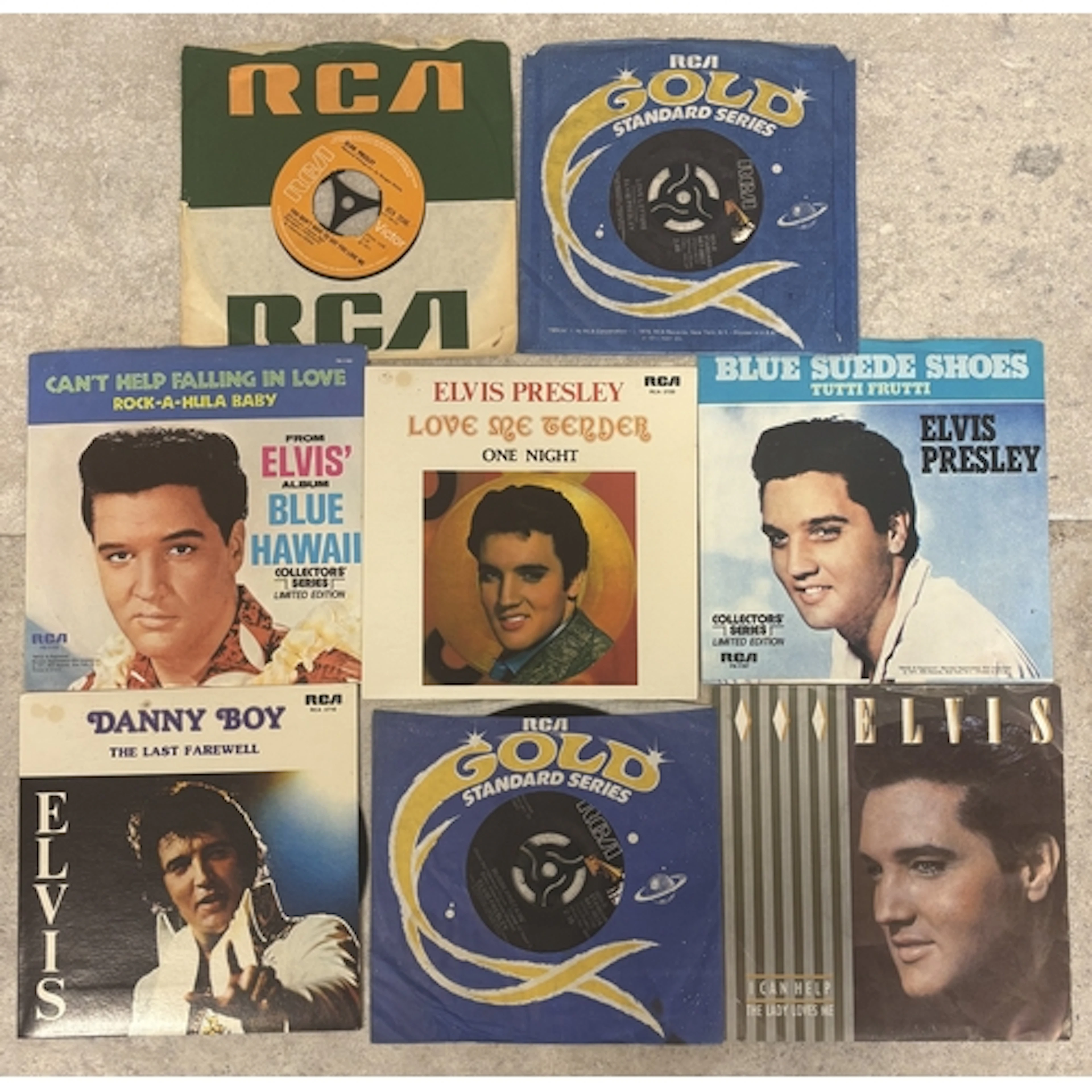 ELVIS PRESLEY: (American, 1935 - 1977): Eight 7 inch vinyl r...