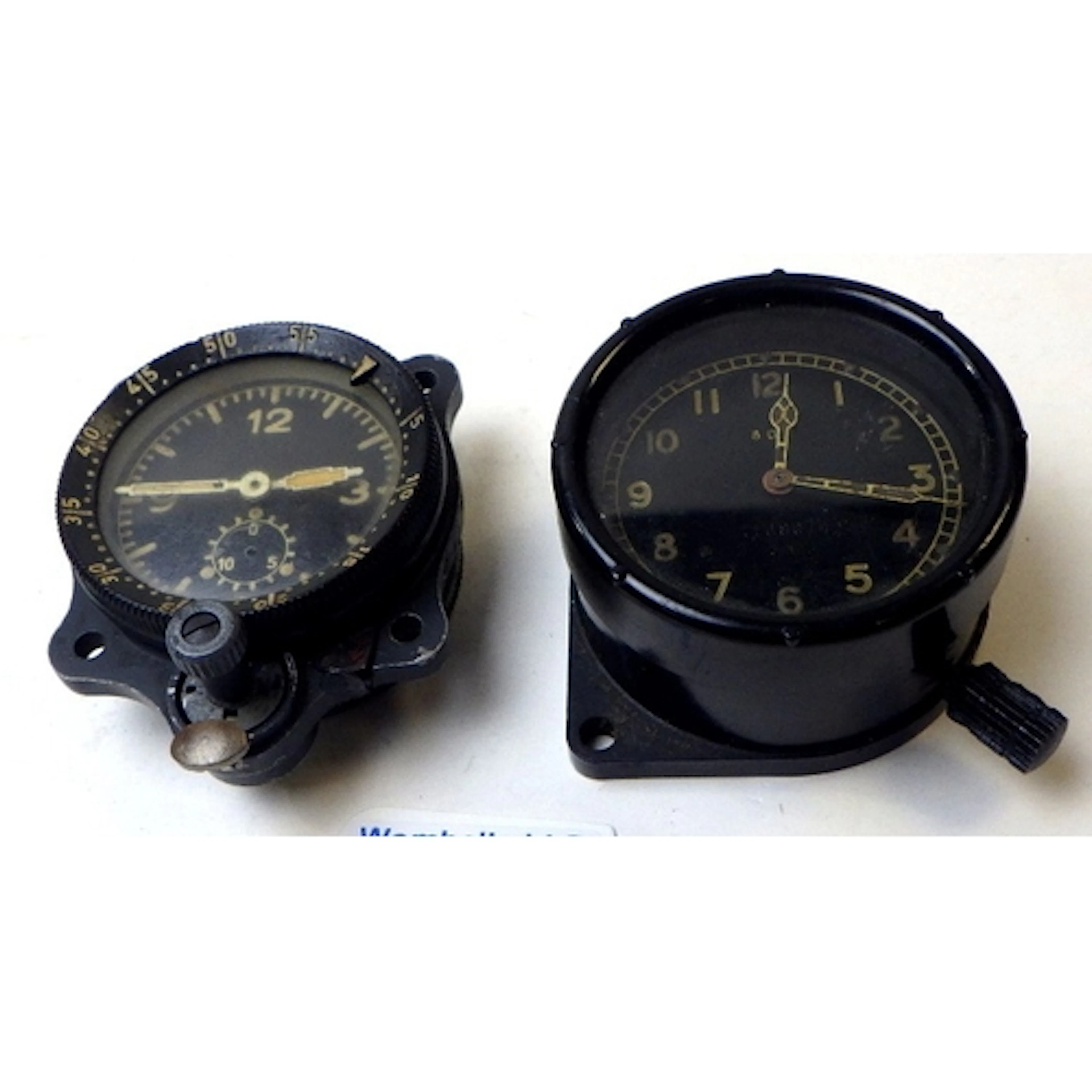 A WW2 Luftwaffe aircraft cockpit clock by Junghans; a WW2 RA...