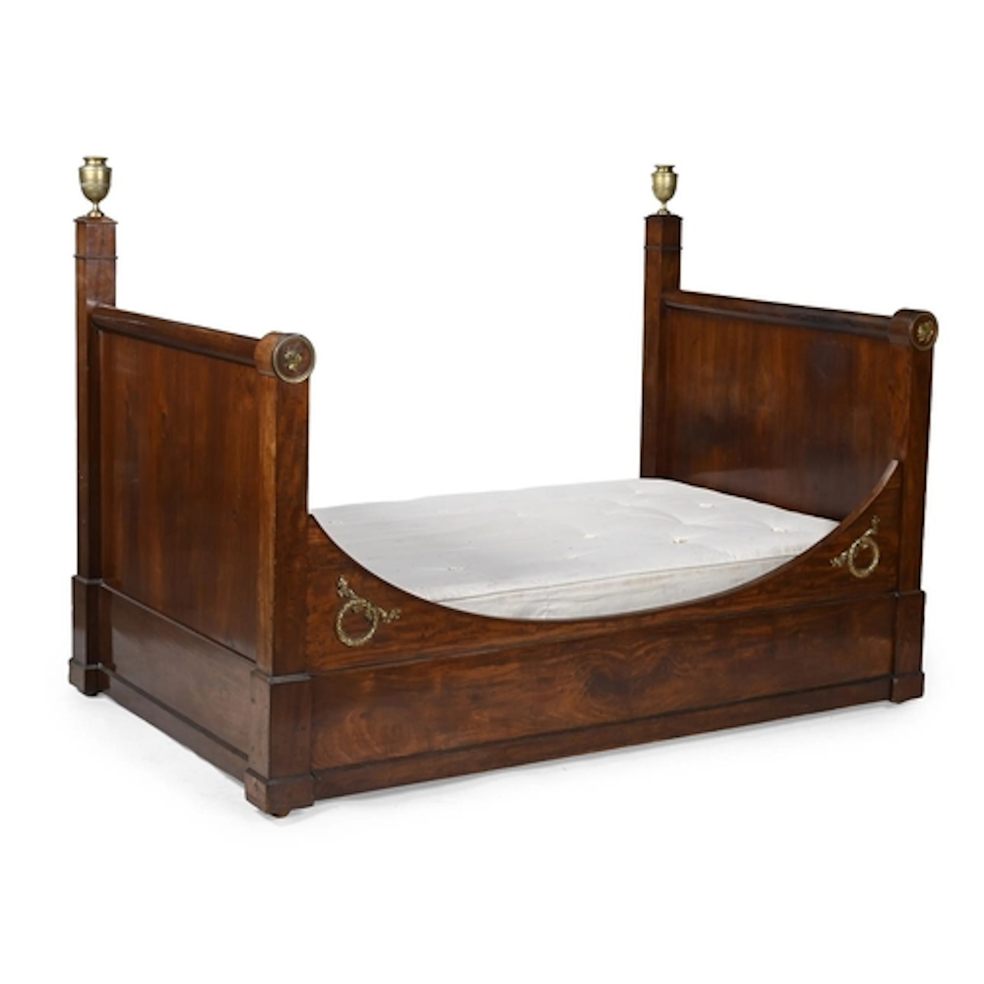 A Louis Philippe mahogany and ormolu mounted bed or lit en b...