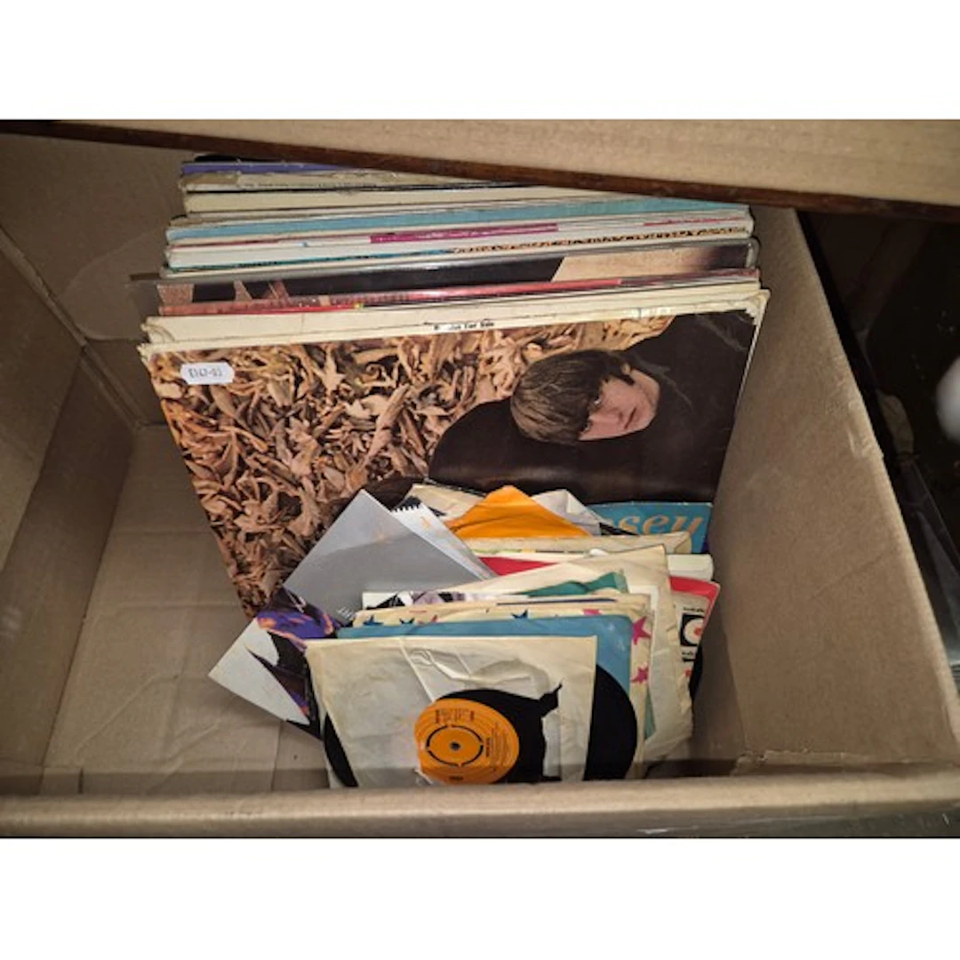 A box of vinyl records