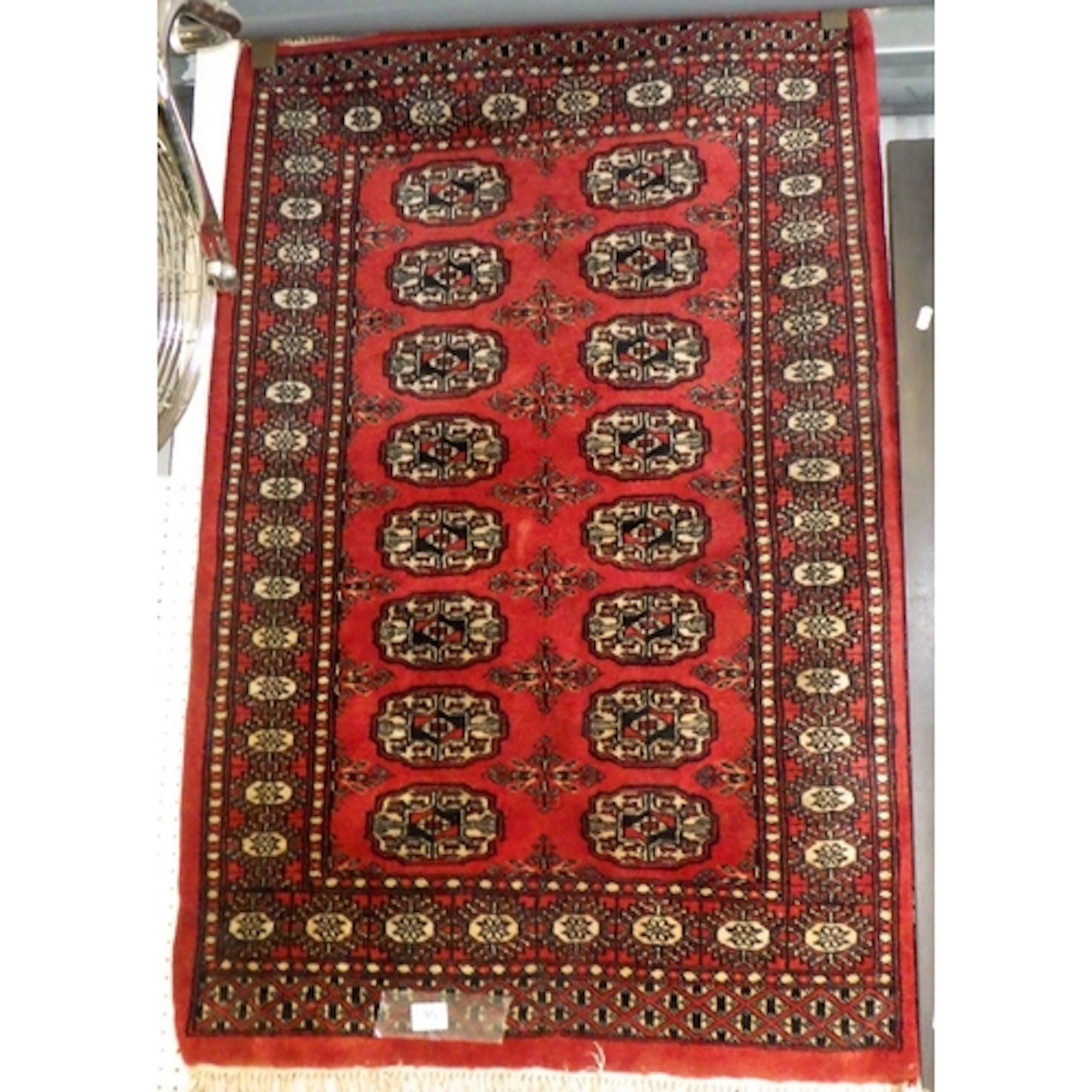 A Pakistan made Bokhara red ground rug