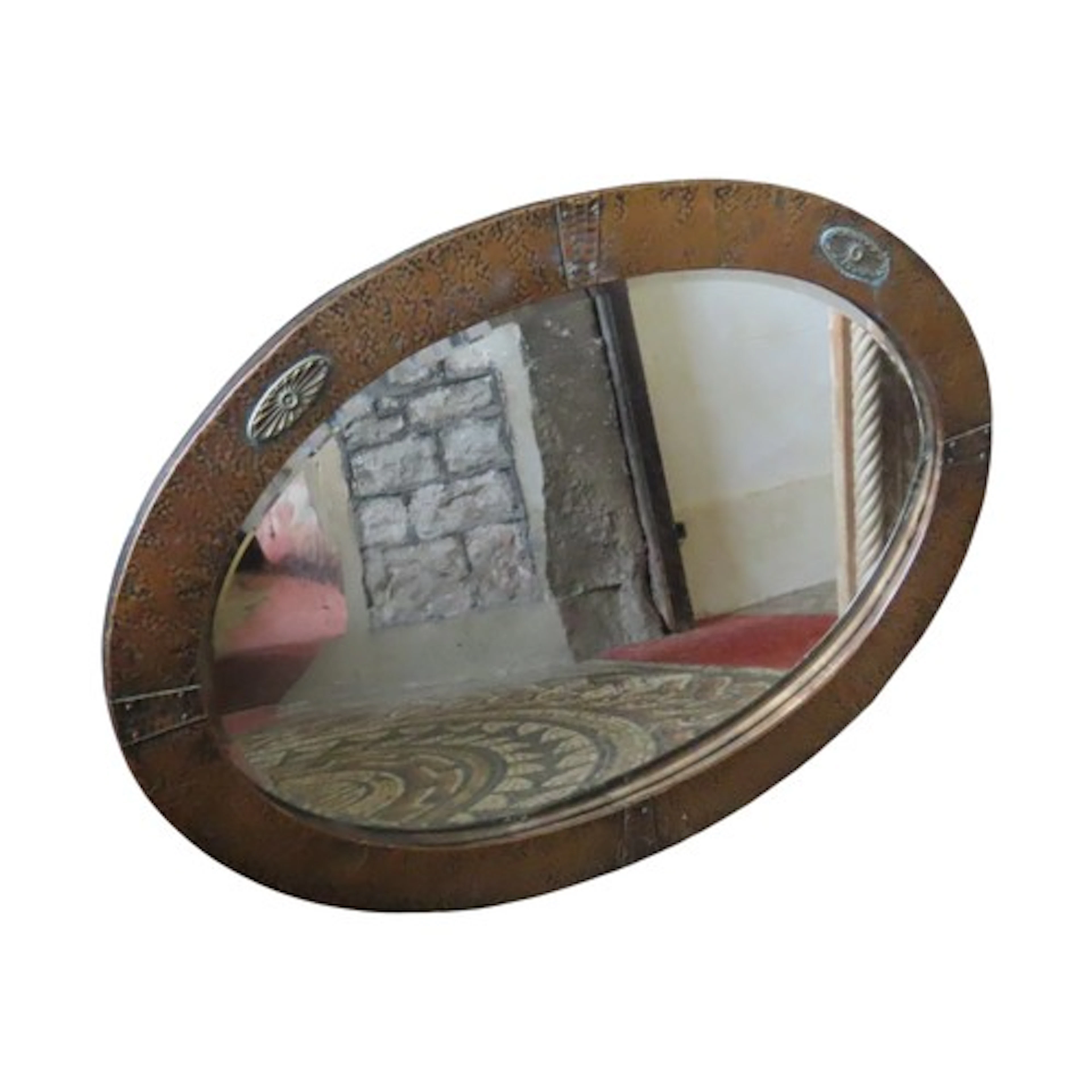 A arts and crafts style oval copper clad wall mirror with be...