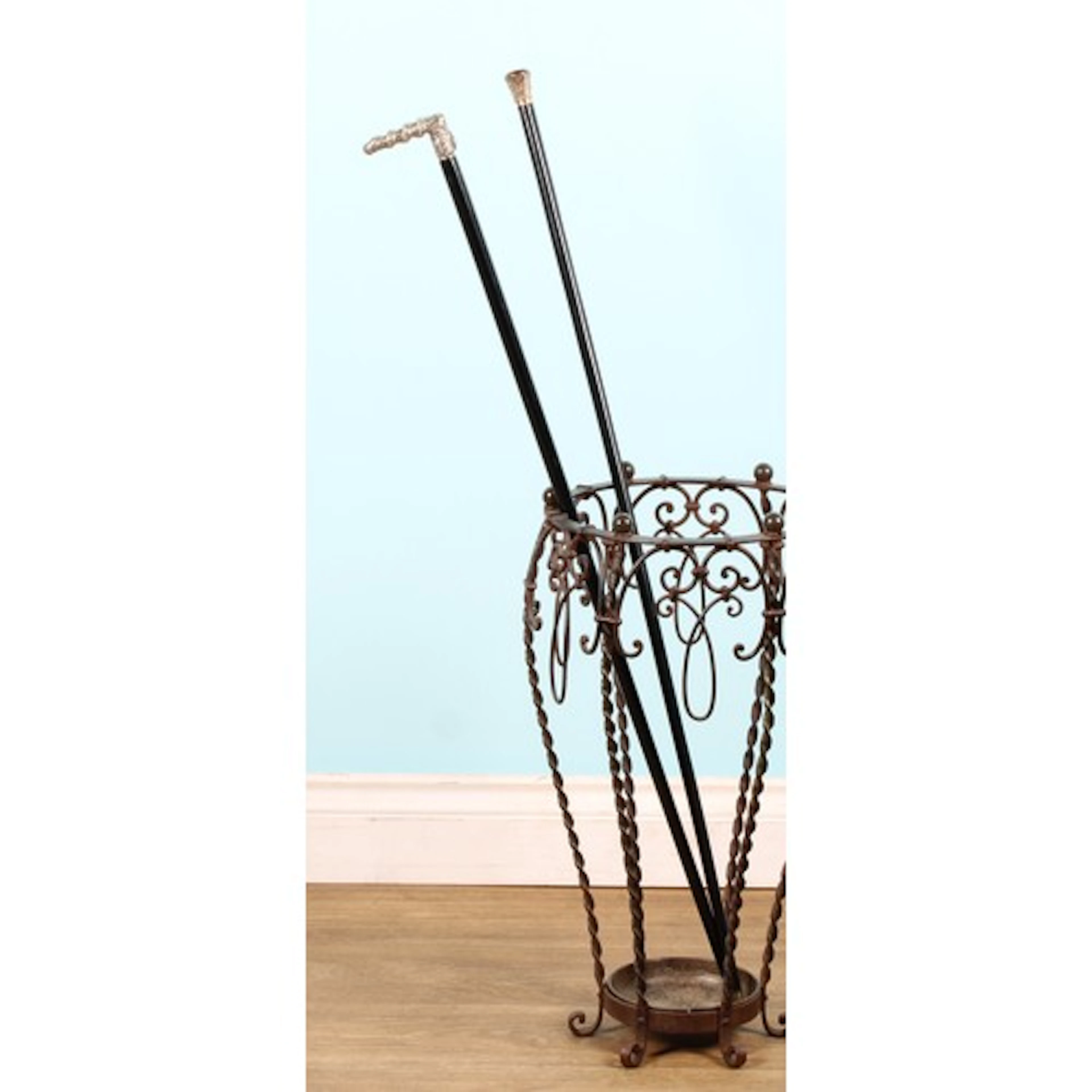 A 19th century silver plate mounted walking stick, the L-sha...
