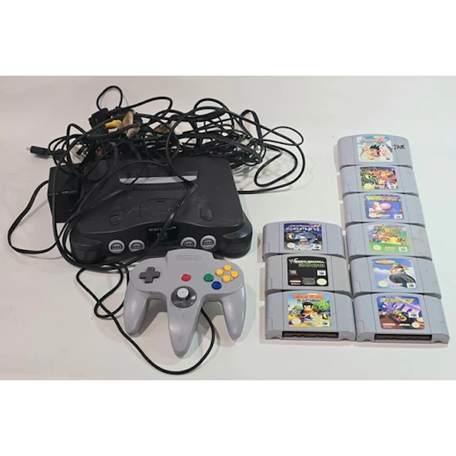 A vintage unboxed Nintendo 64 games console c/w leads and a ...