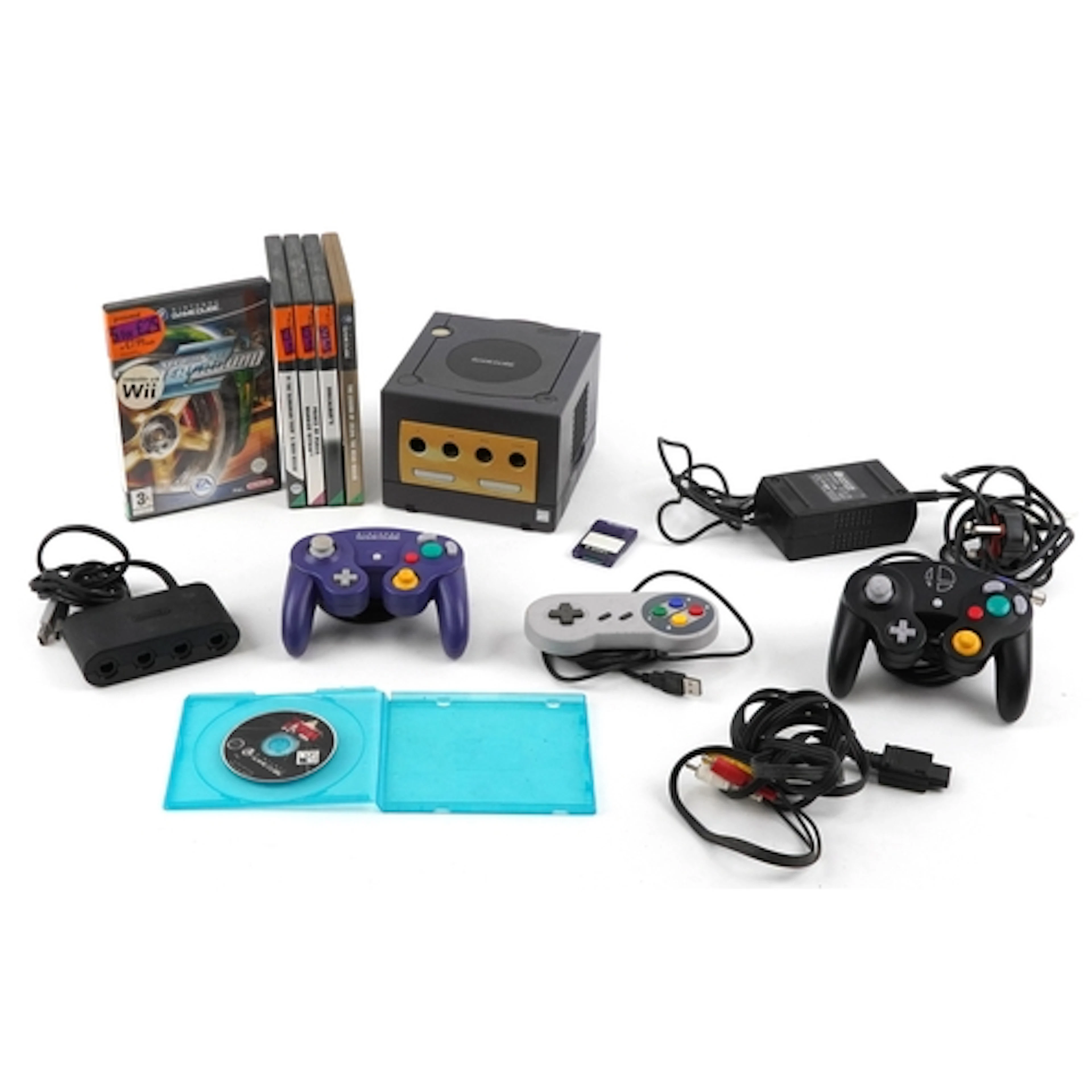 Nintendo Game Cube games console with a selection of control...