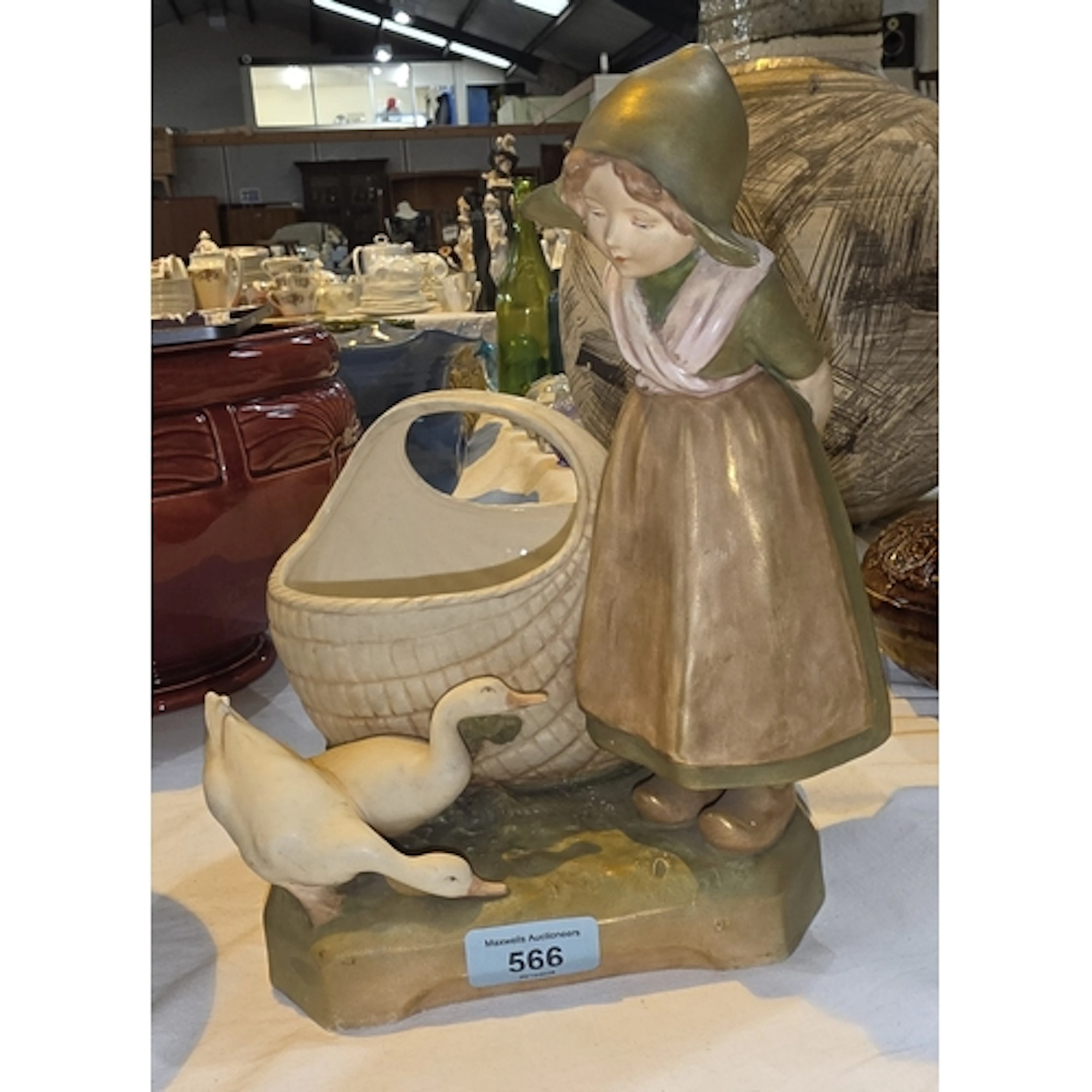 Royal Dux figure of a girl with large basket and swans, heig...
