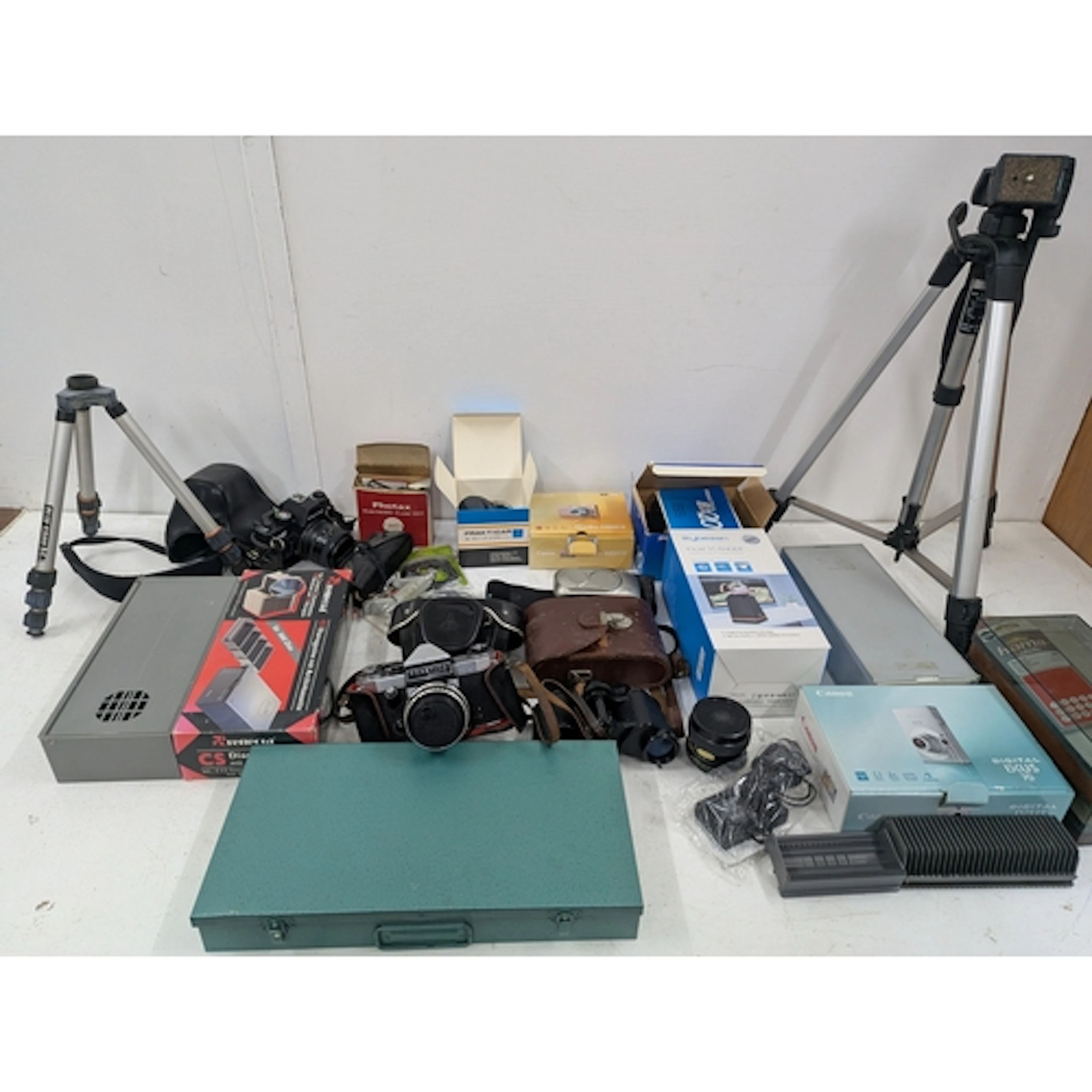 Photographic equipment to include a Praktica BX20 and a Supe...