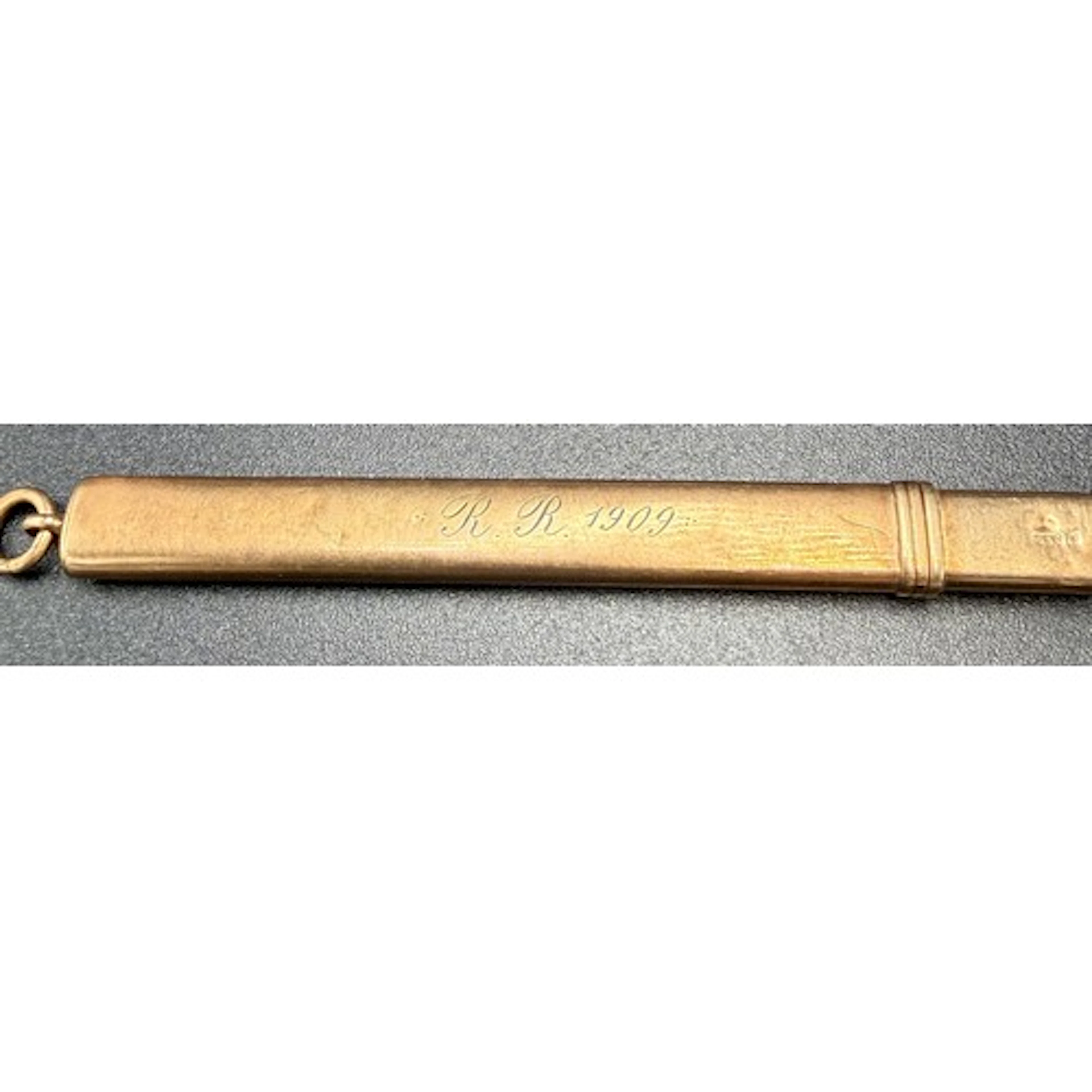 A 9 carat gold cased pencil holder. 7.5cm l. 4.6gm.