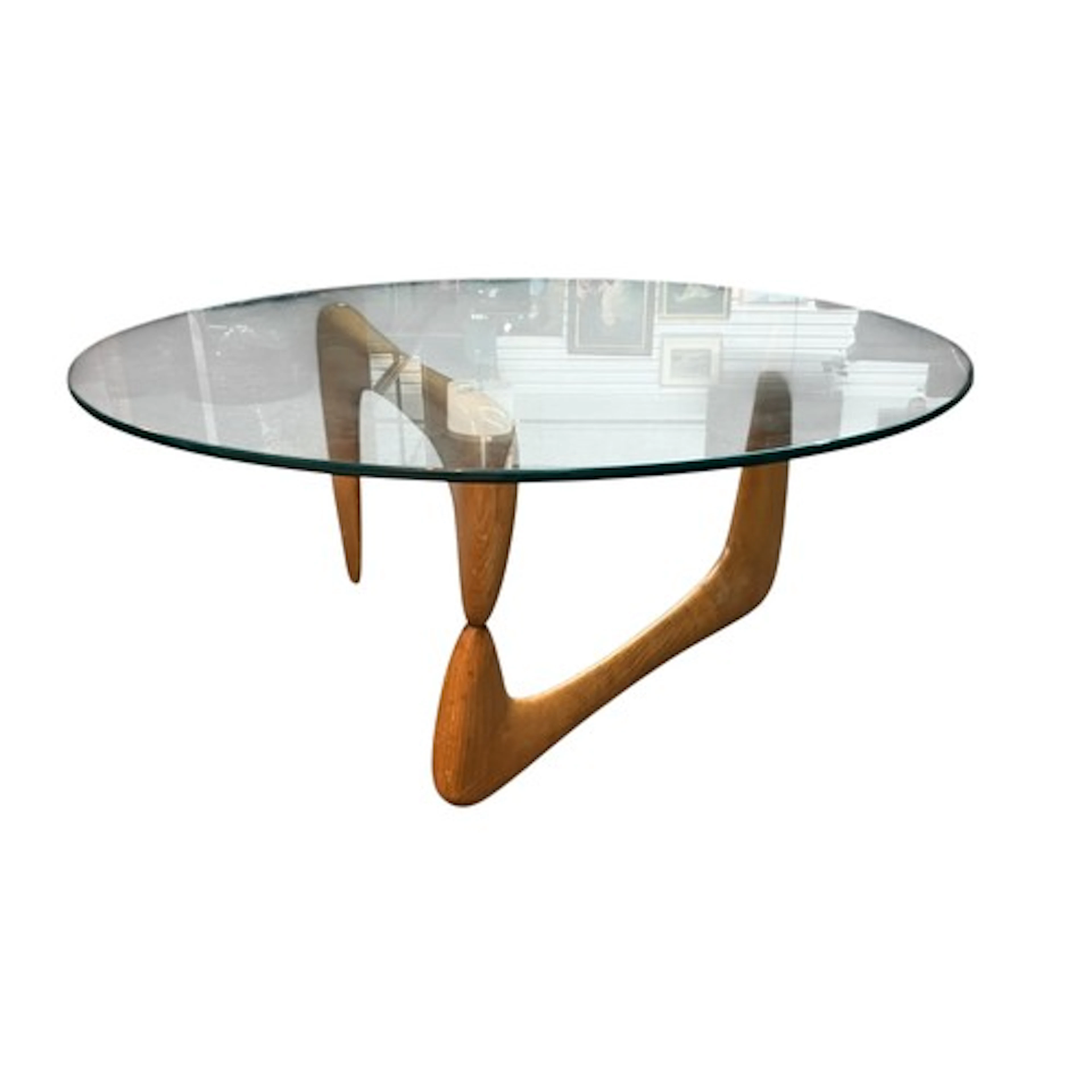 Noguchi-style glass-topped coffee table.