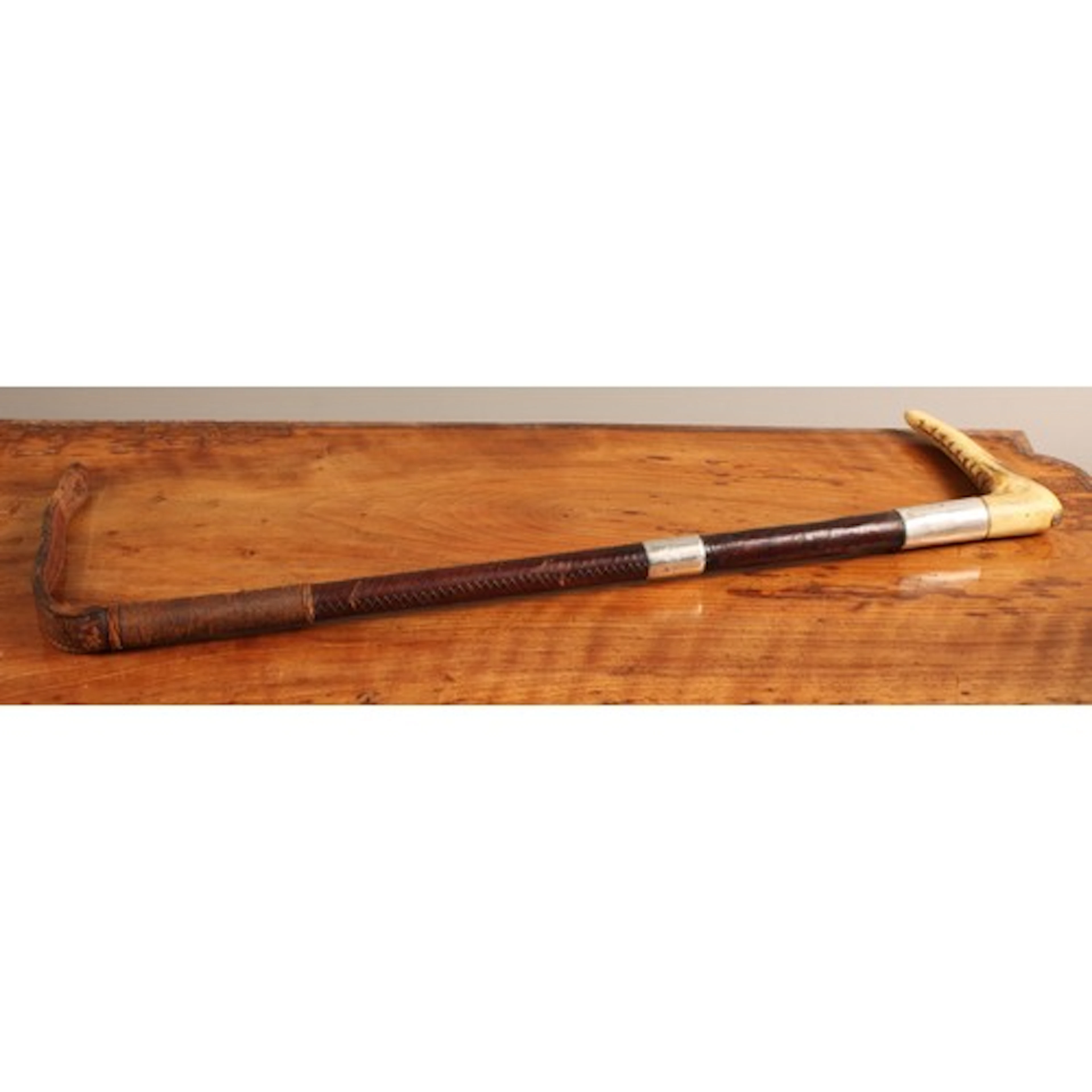 An early 20th century silver mounted riding crop, by Swaine ...