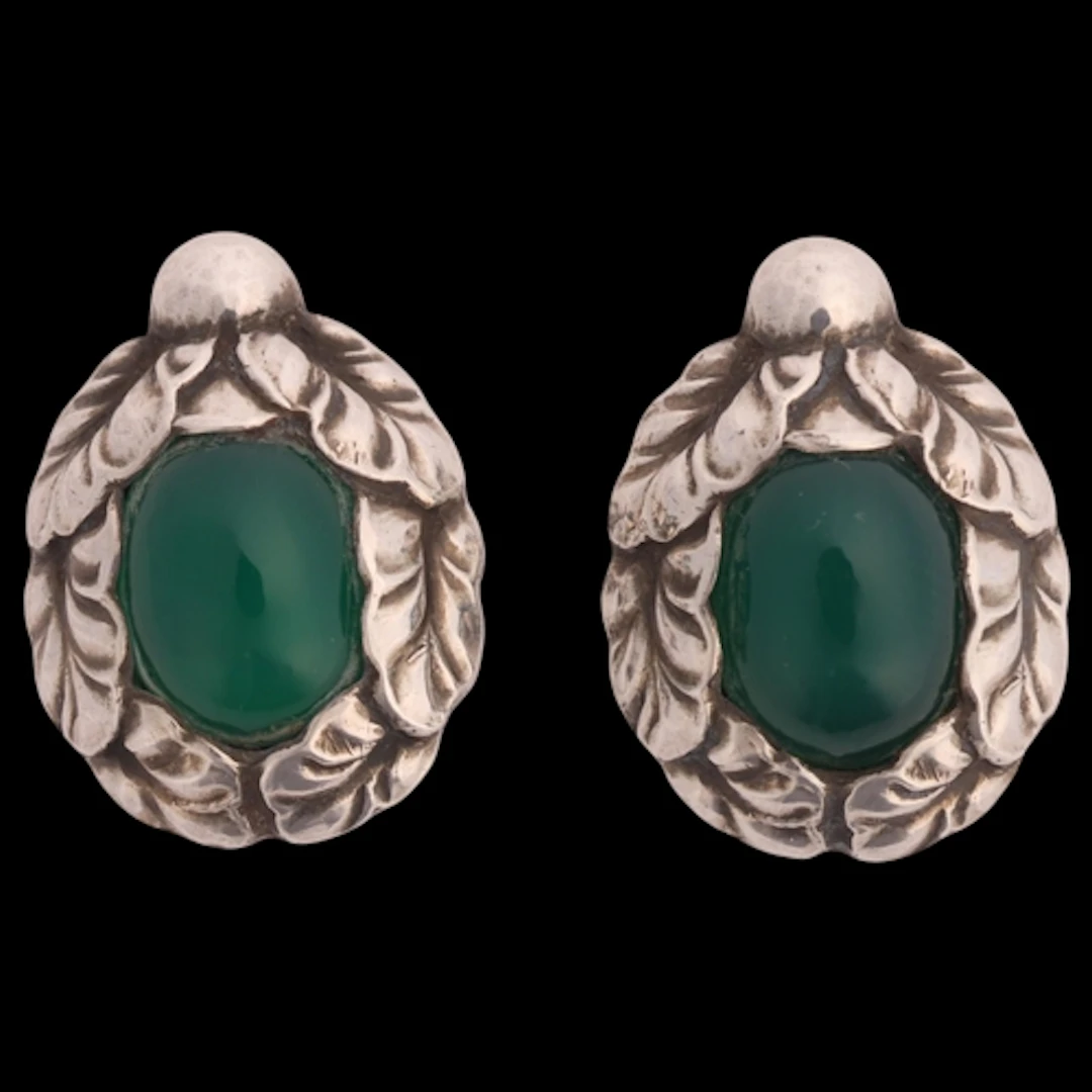 GEORG JENSEN - a pair of Art Nouveau style Danish sterling s...