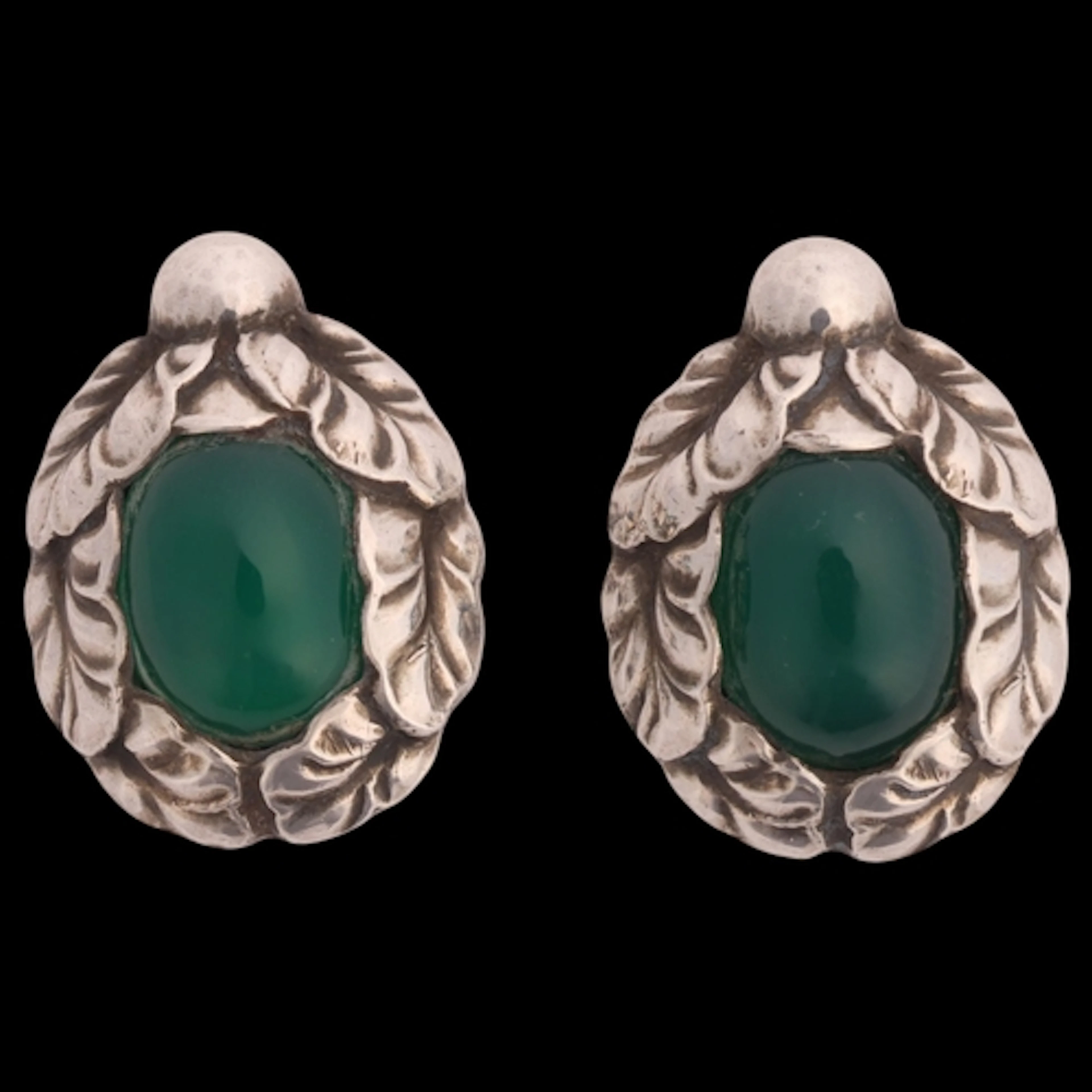 GEORG JENSEN - a pair of Art Nouveau style Danish sterling s...
