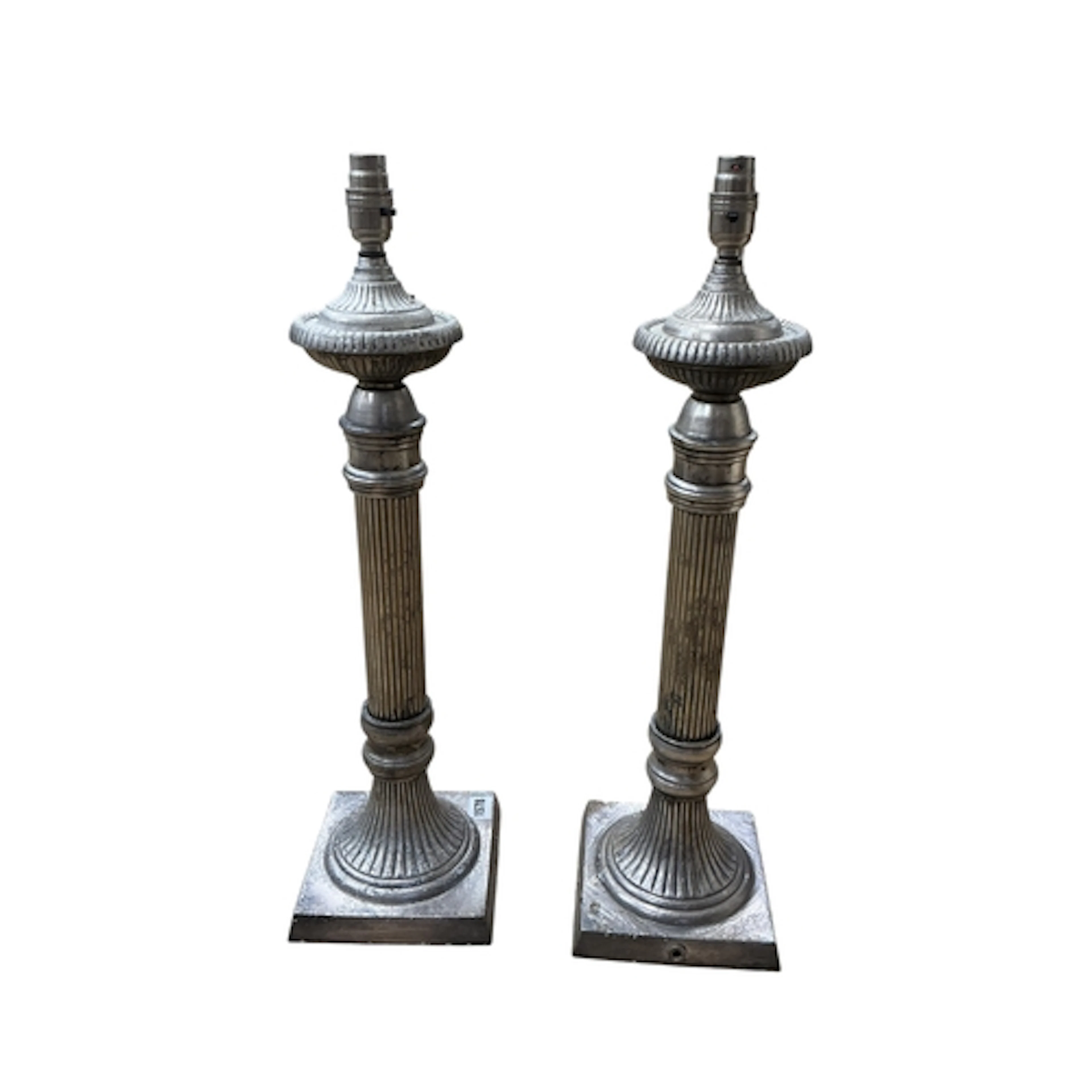 A pair of modern silvered metal fluted column silvered table...