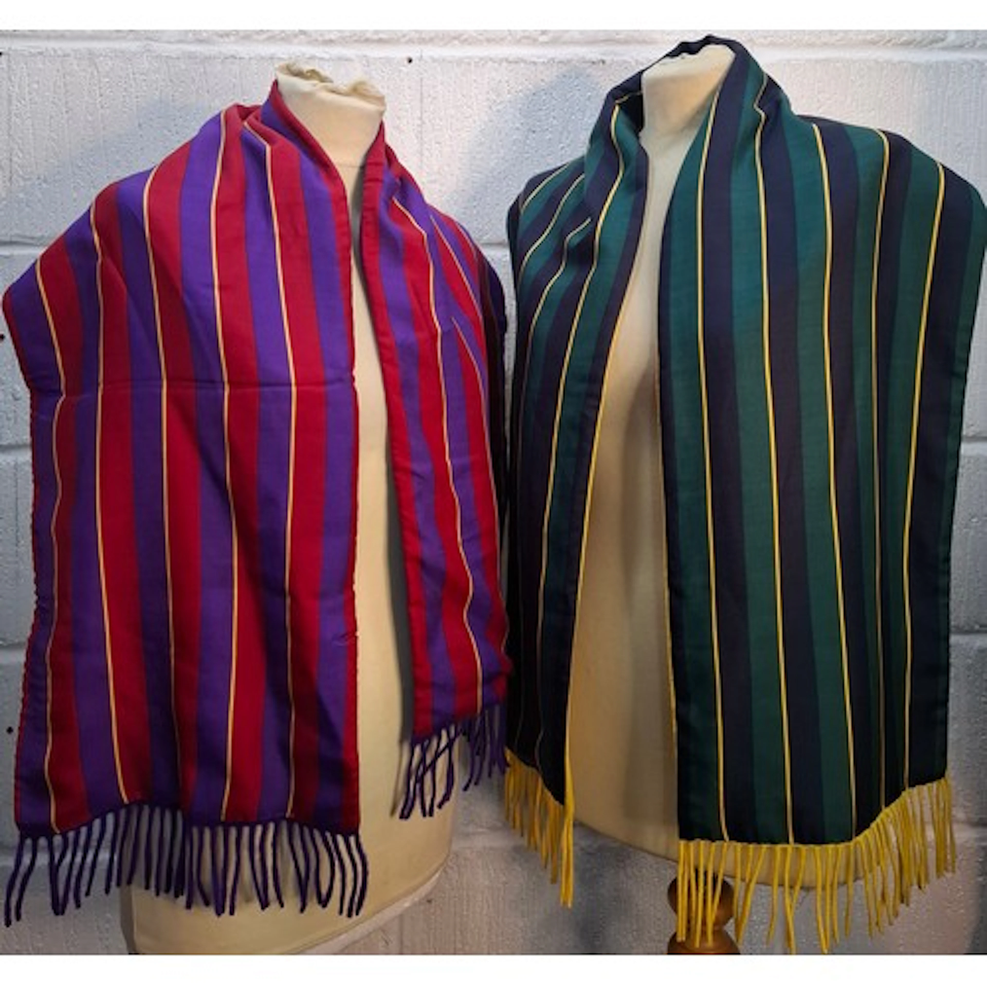 Burberrys- Two silk and wool mix striped scarves, one in gre...