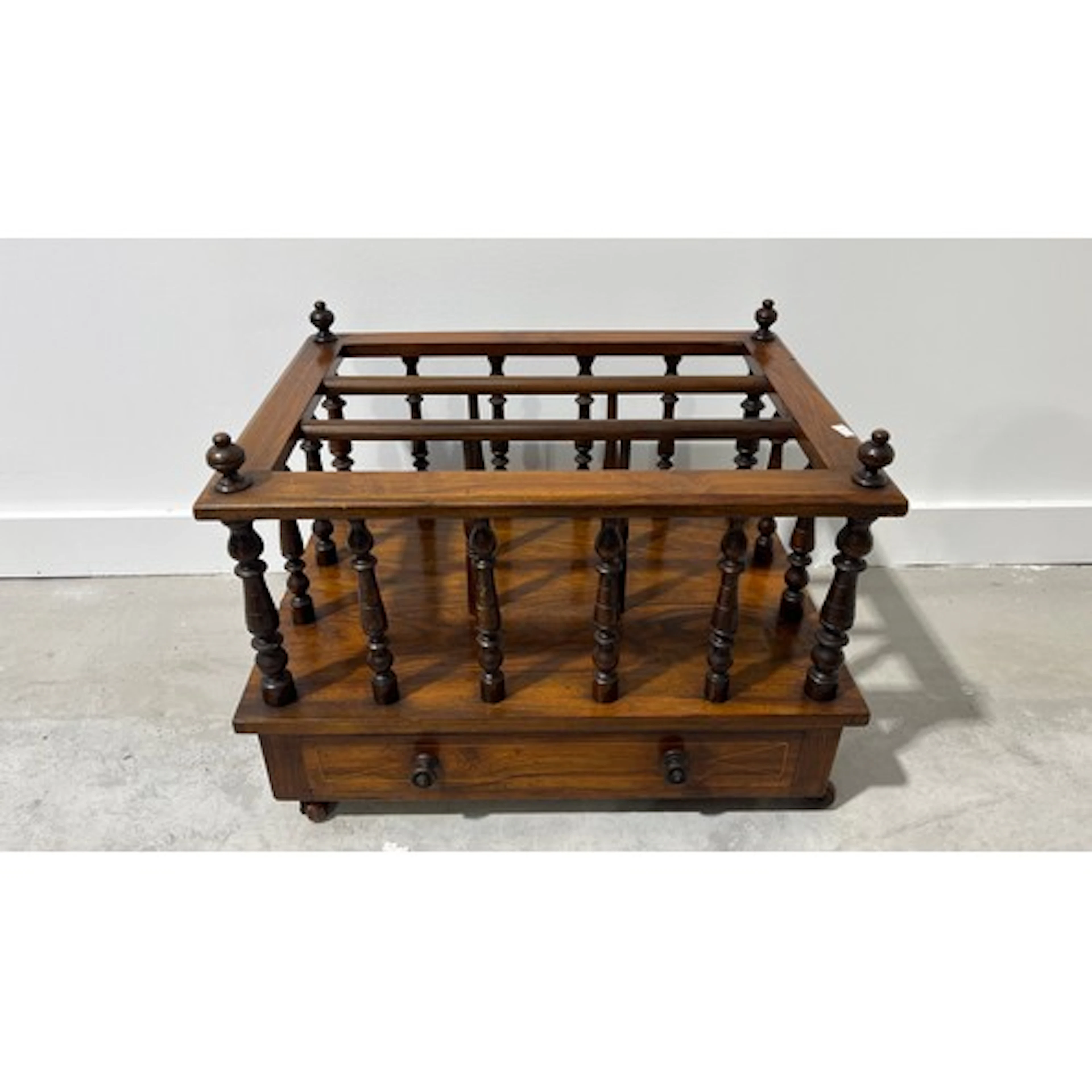 Late 19th century walnut Canterbury with baluster turned sup...