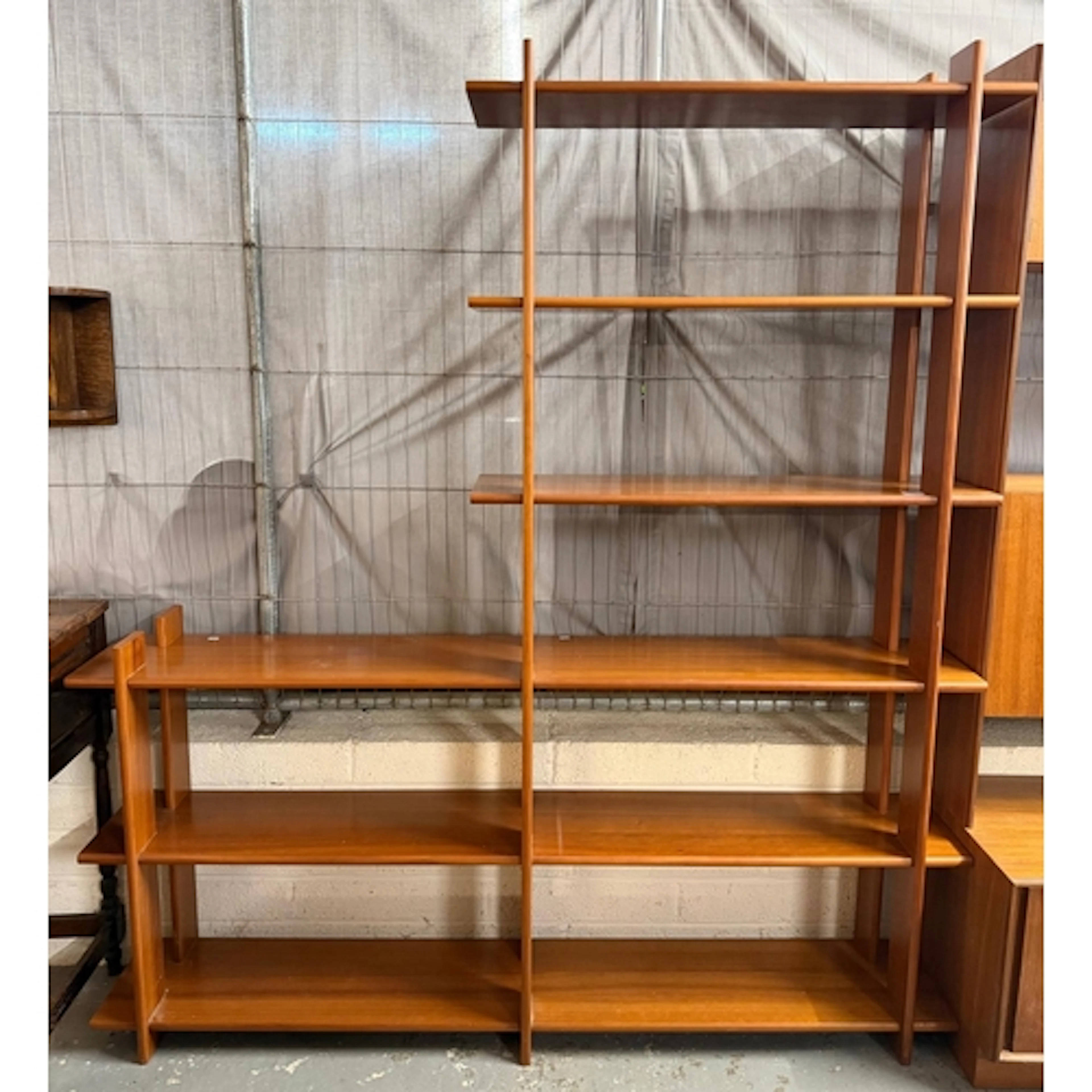 Set of mid century teak asymmetrical sectional shelves. (W)1...