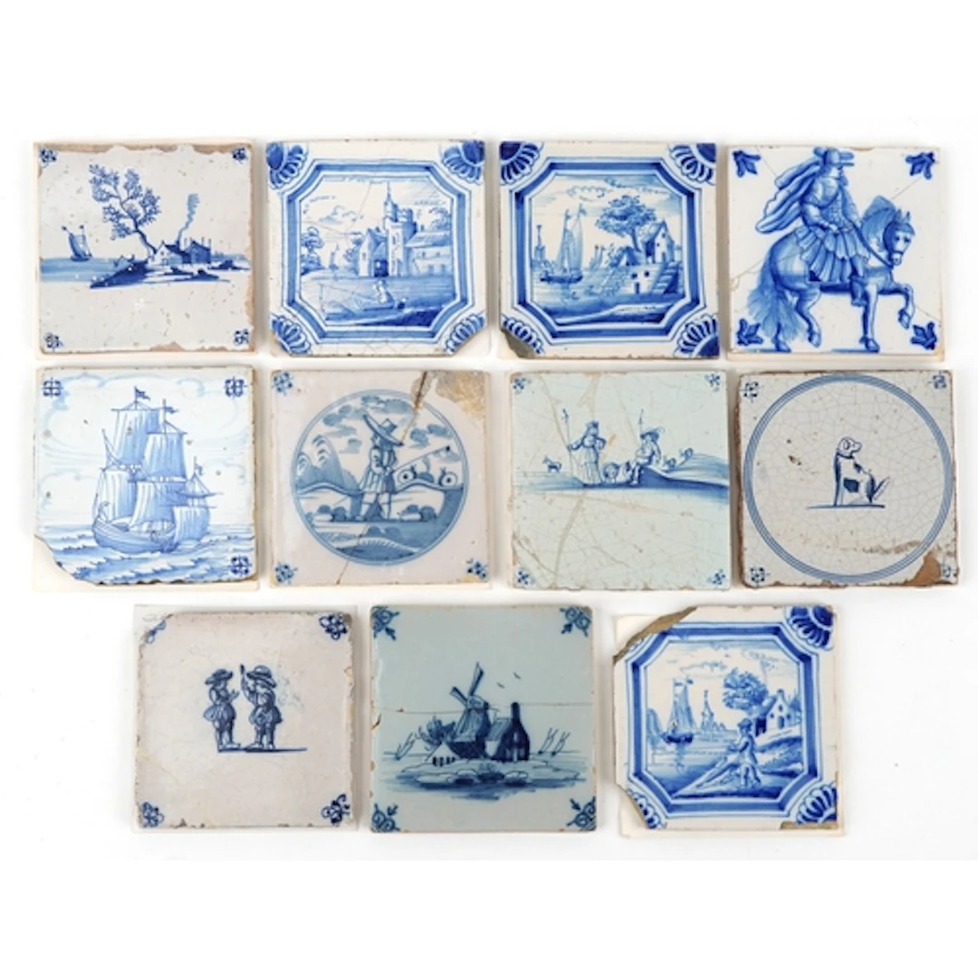 Eleven 18th/19th century Dutch pottery tiles hand painted wi...
