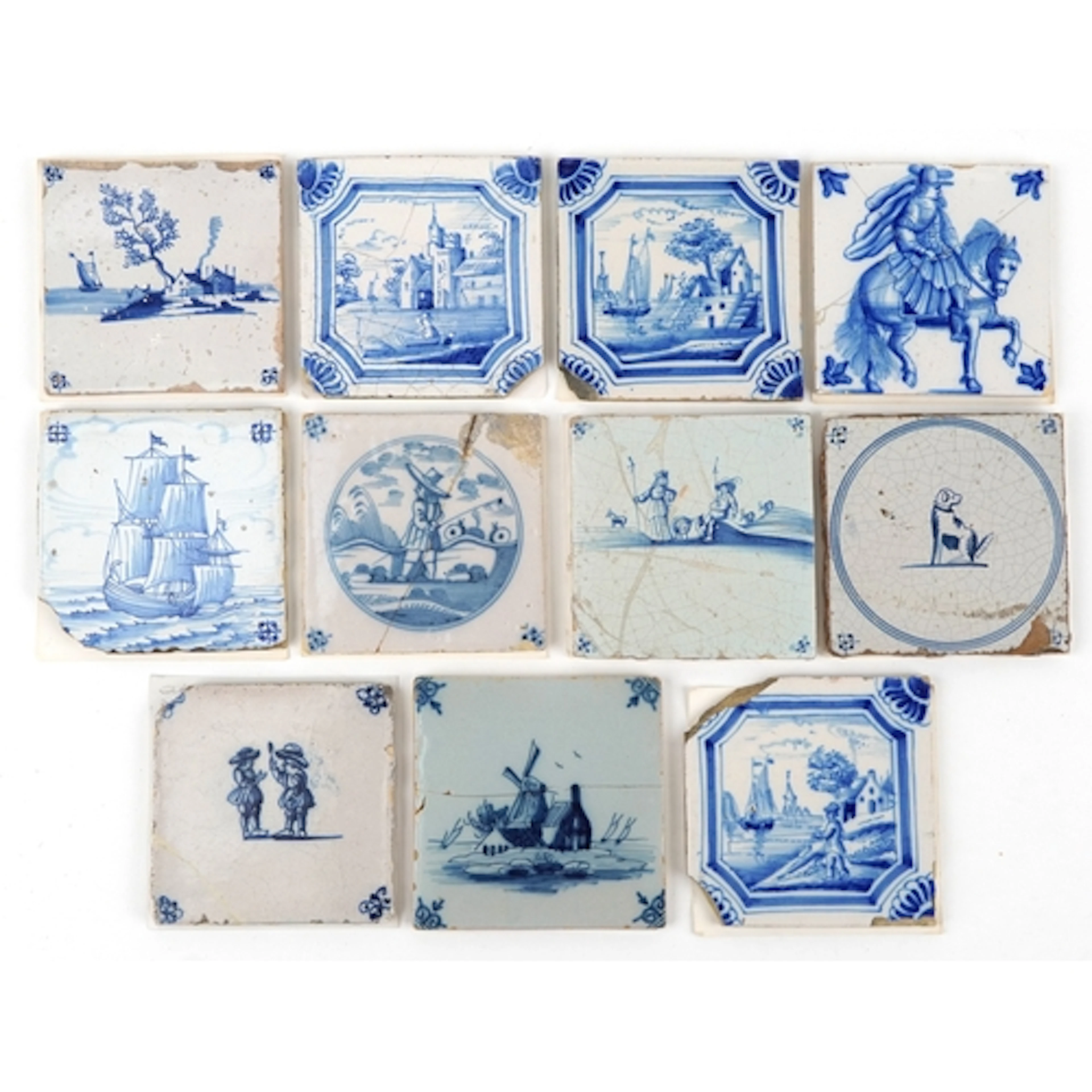 Eleven 18th/19th century Dutch pottery tiles hand painted wi...