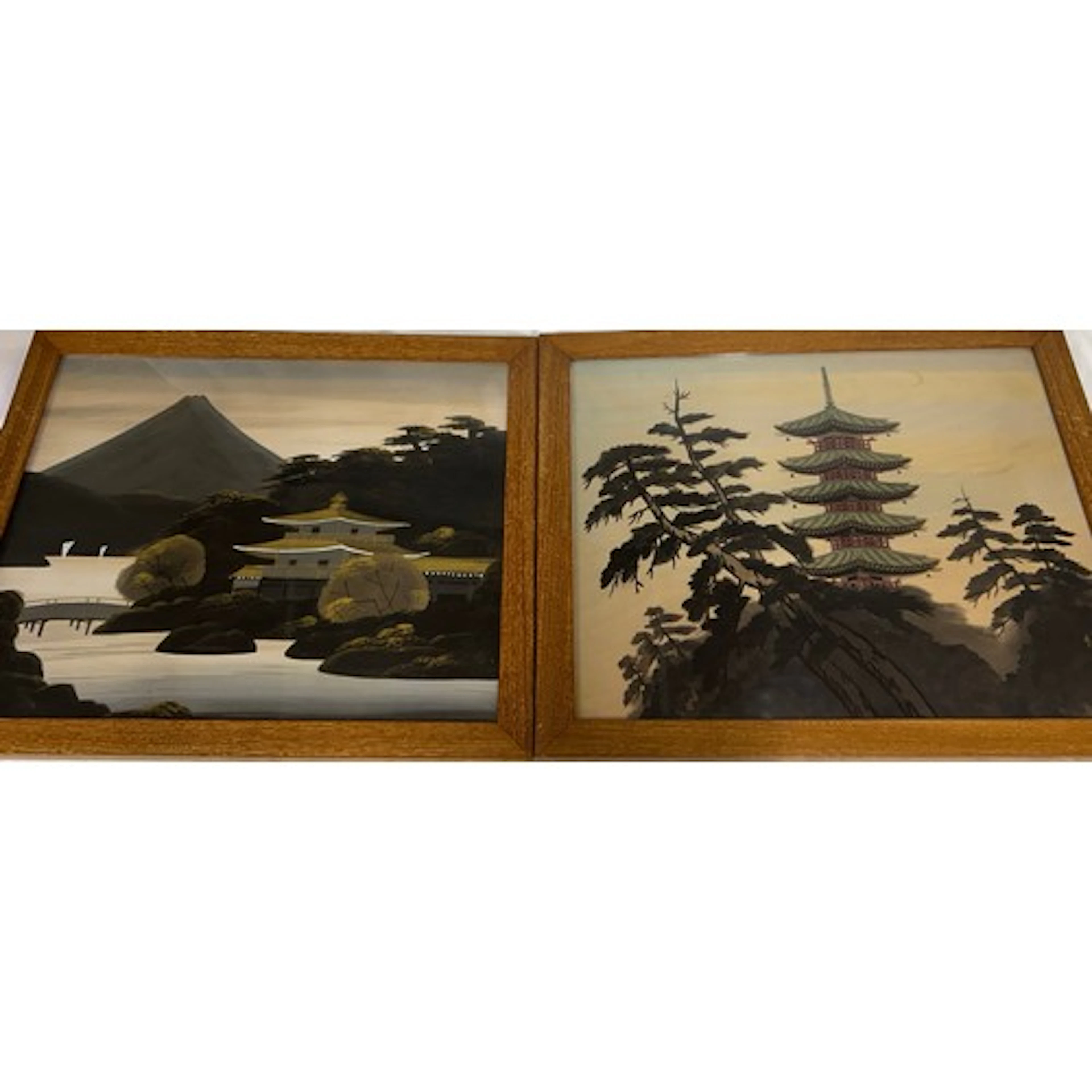 A pair of framed vintage Oriental silk paintings depicting p...
