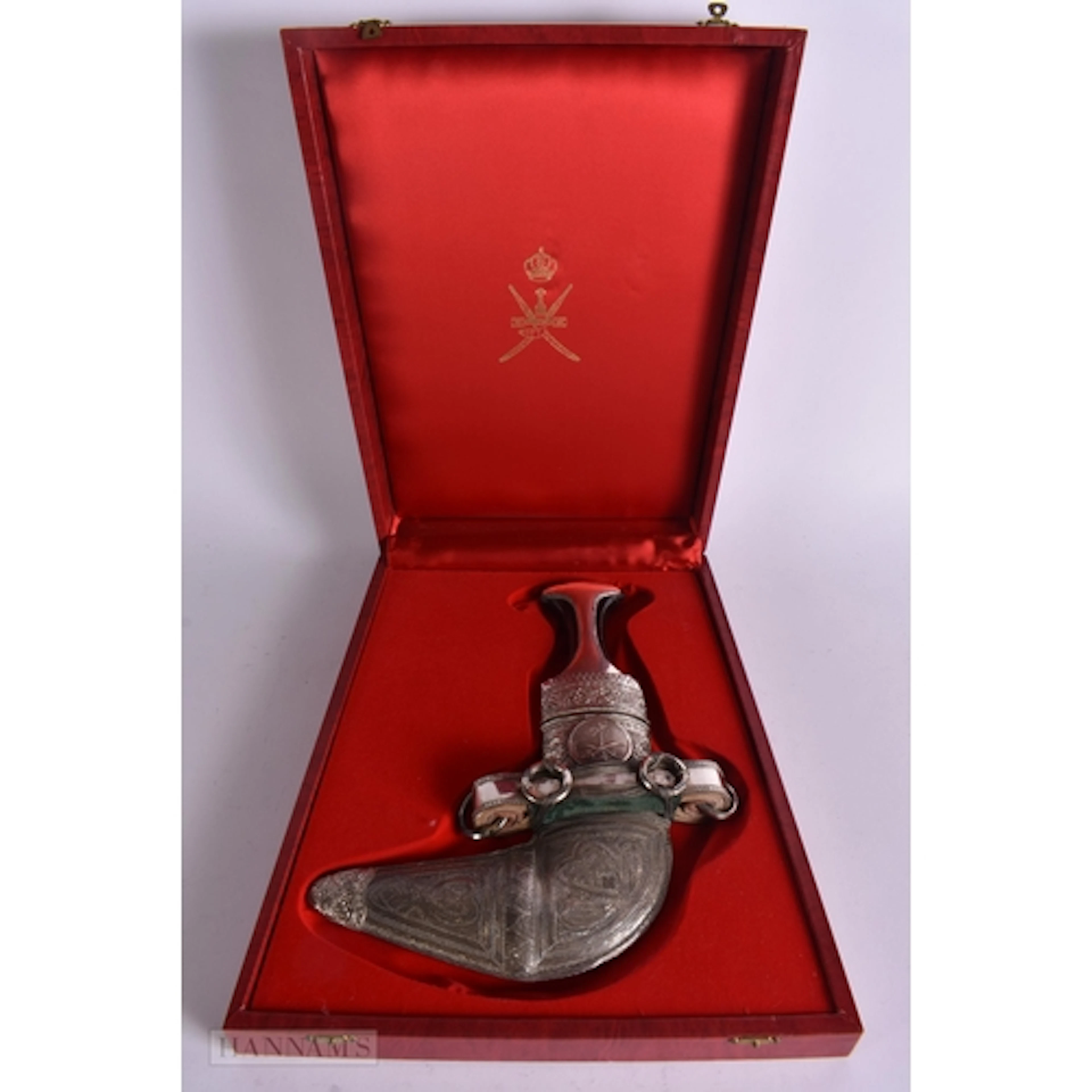 A LARGE MIDDLE EASTERN WHITE METAL JAMBIYA DAGGER. Dagger 34...