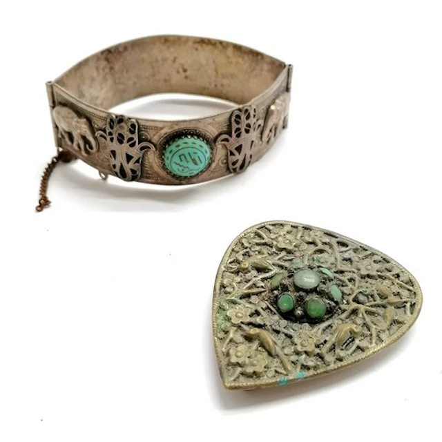 Middle Eastern marked silver bangle with elephant, hand of f...