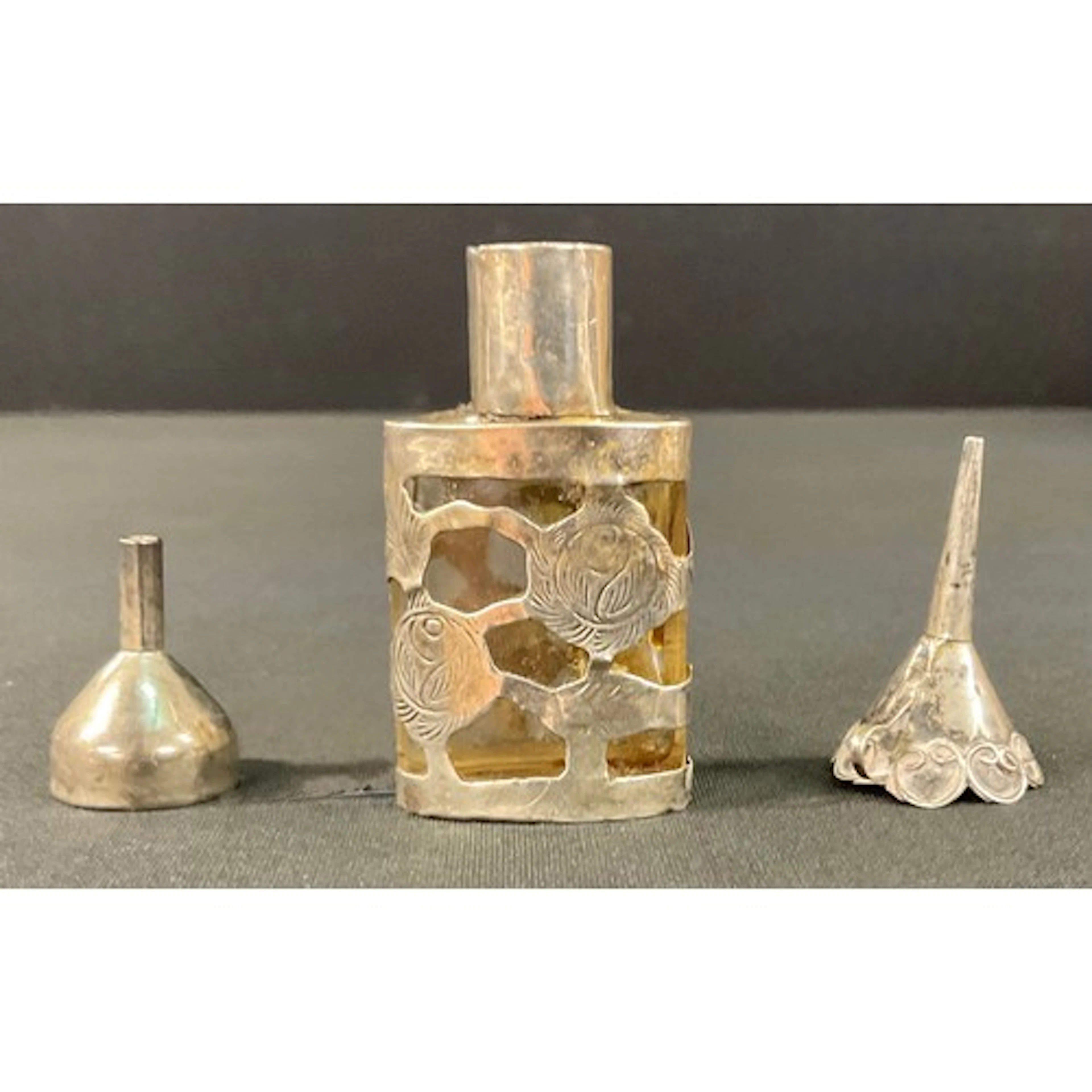 A sterling silver overlaid glass scent bottle and cover, app...
