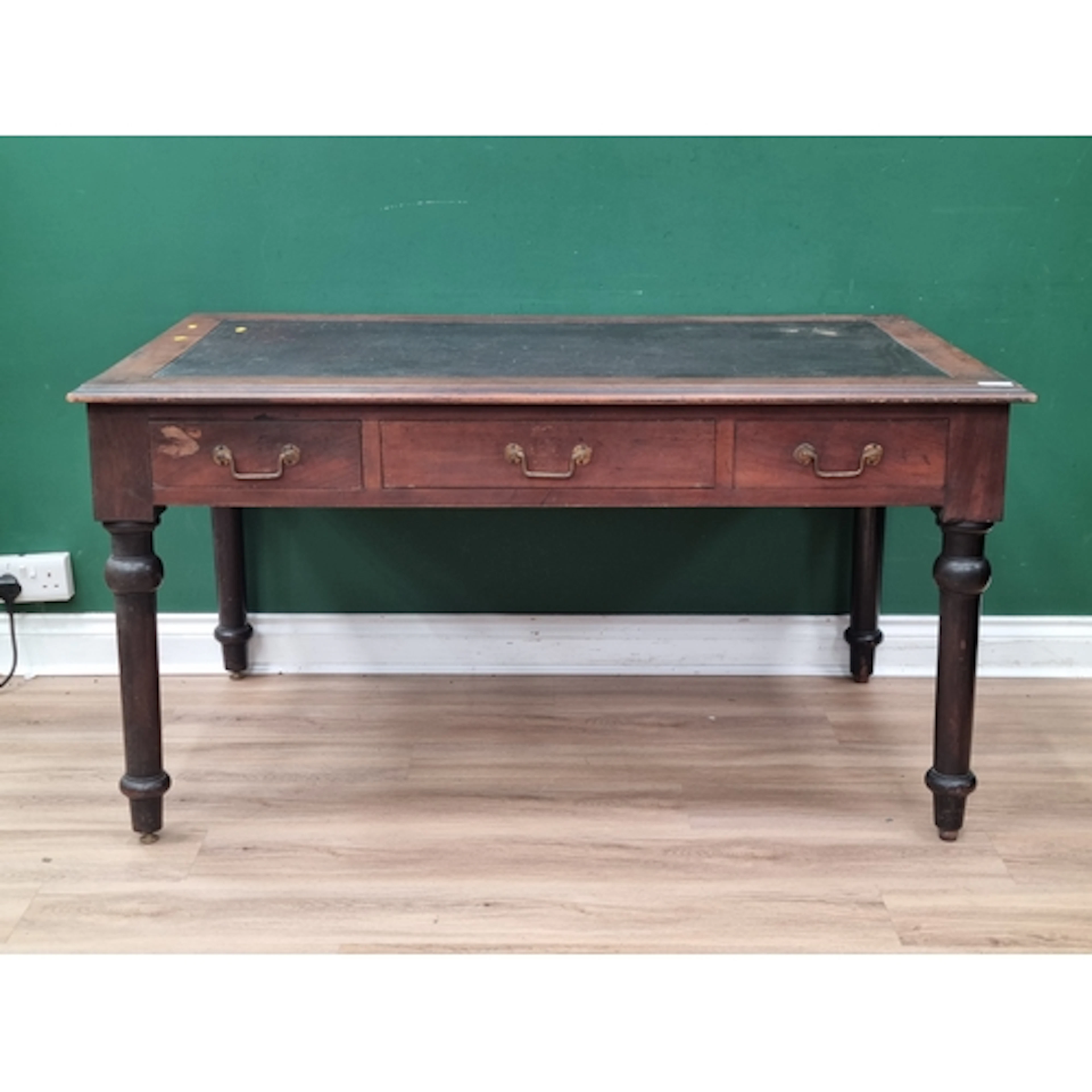 A mahogany partners Desk with leather inset top fitted six d...