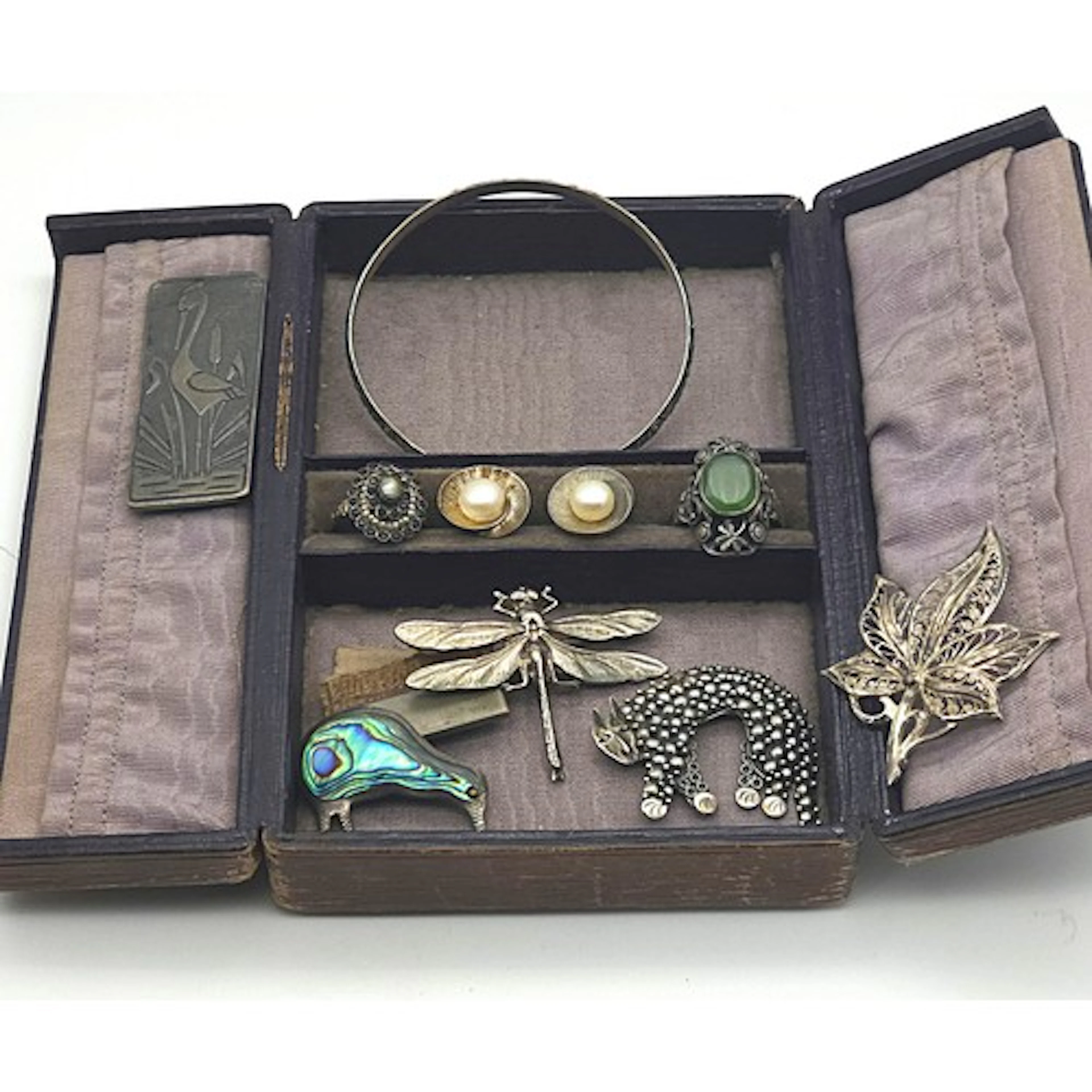 A collection of silver and white metal jewellery, to include...