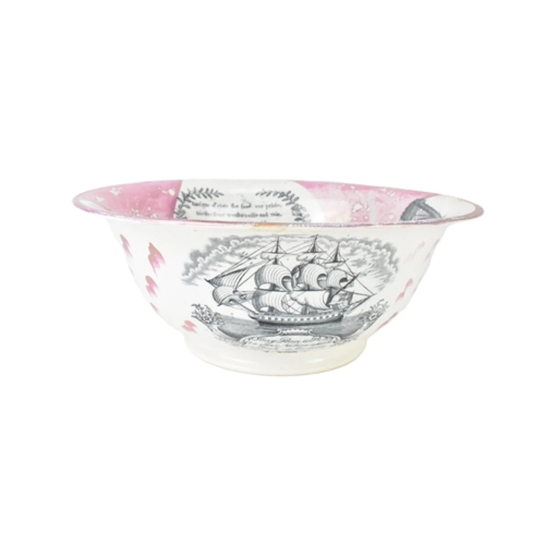 A 19th century Sunderland pink lustreware sailor’s bowl, bla...