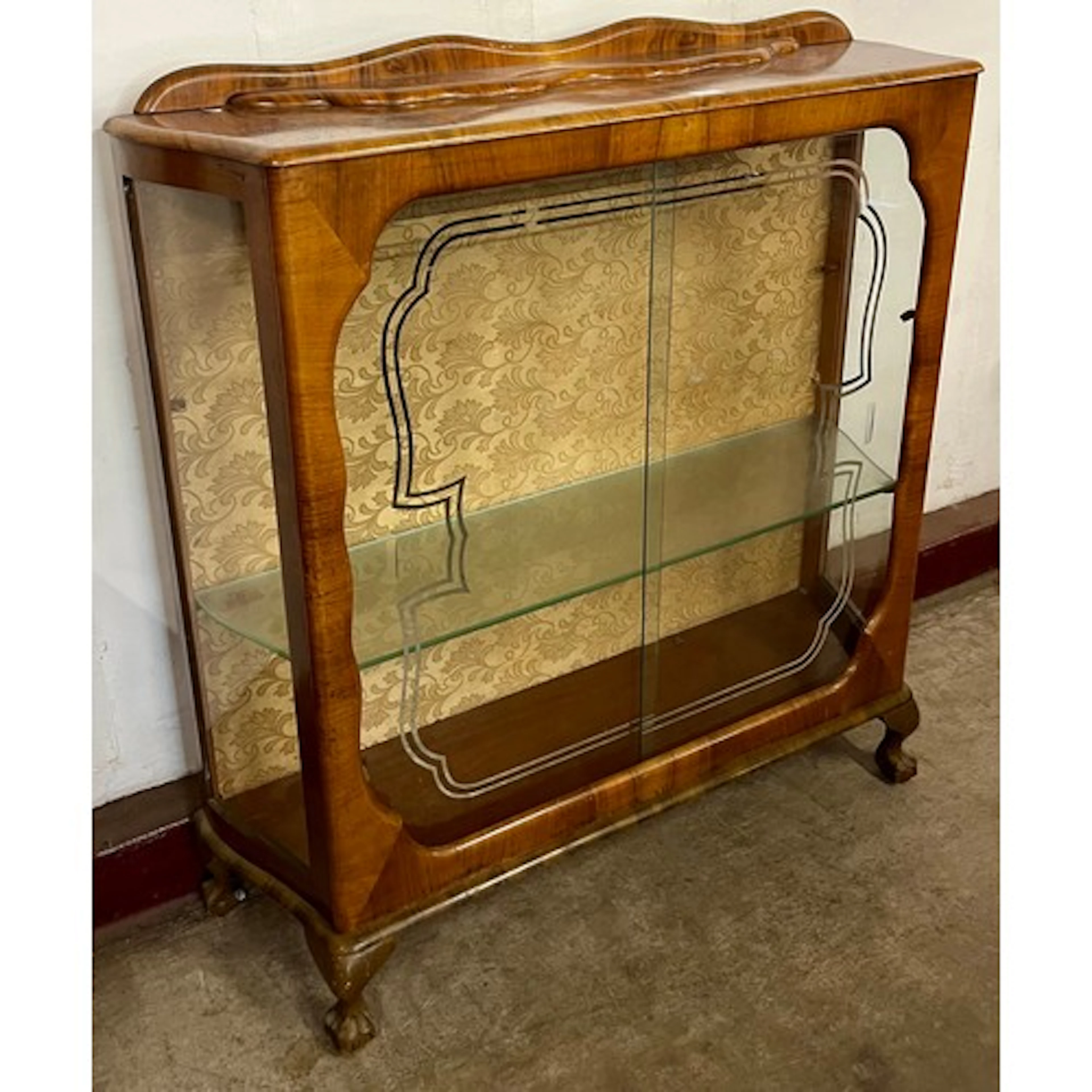 An Art Deco walnut display cabinet