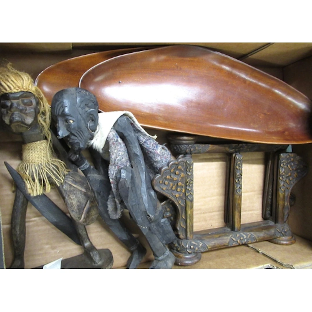 Two African carved figures, two bowls, and two stands