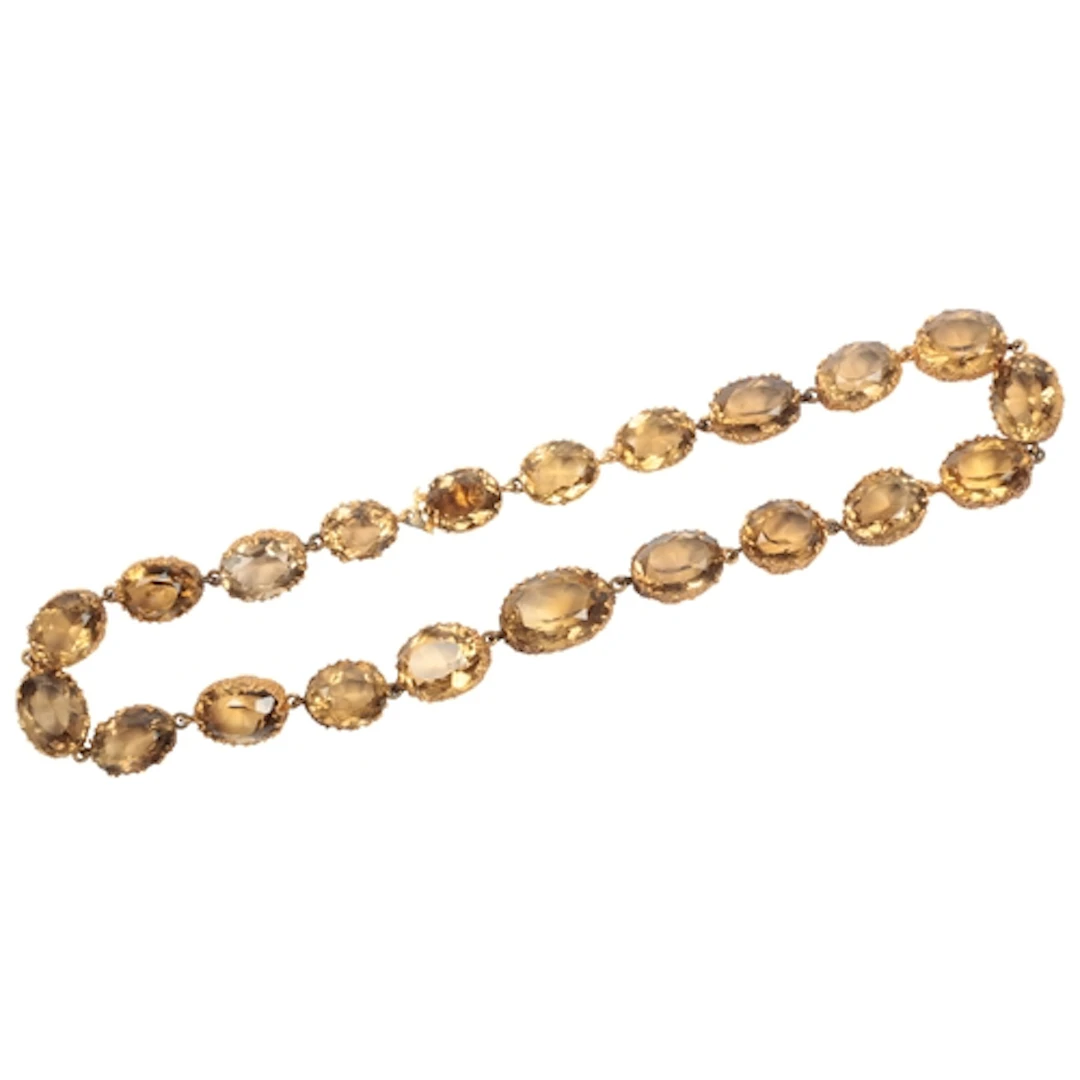A smoky quartz rivière necklace, composed of links set with ...